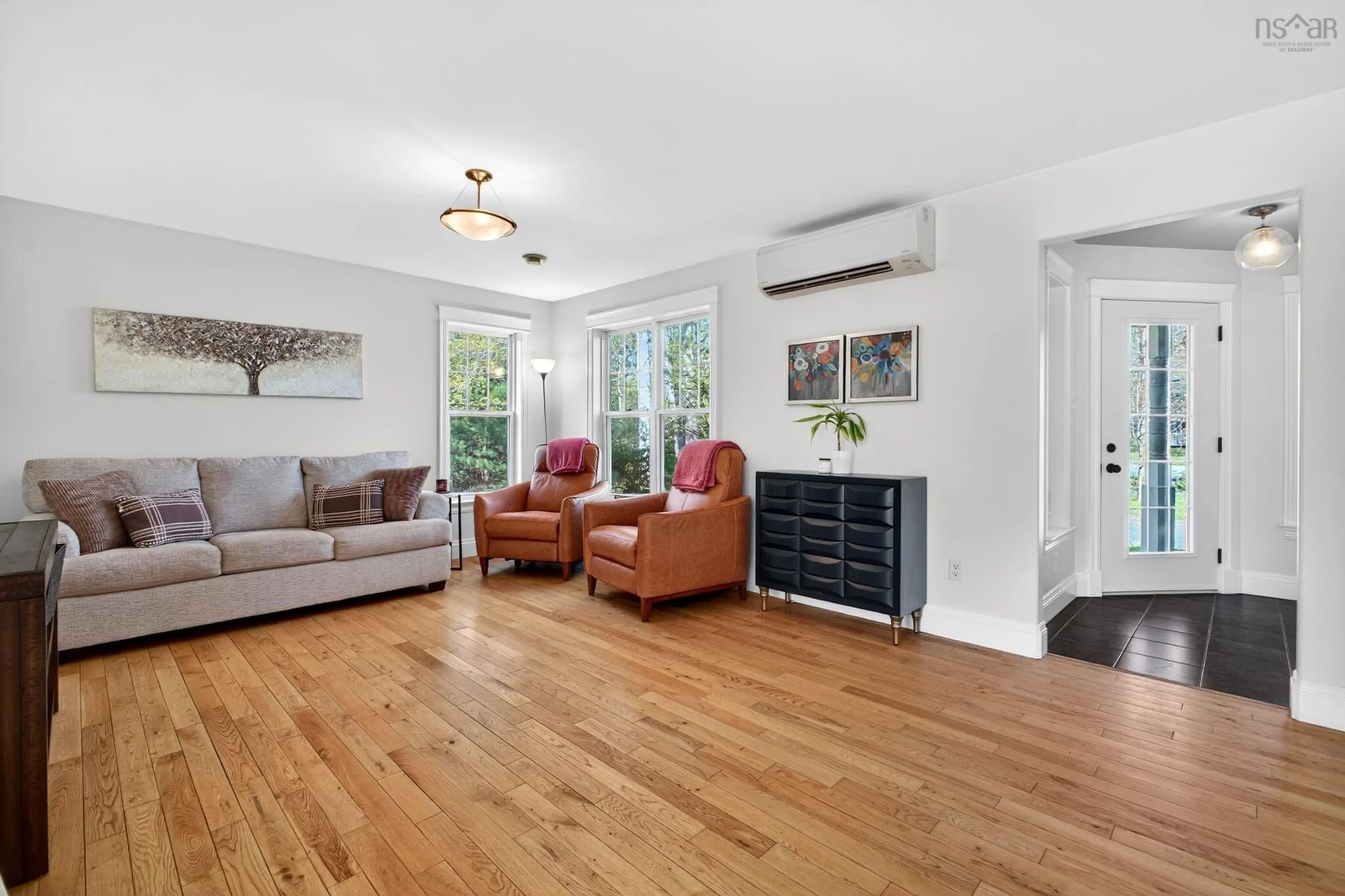 Living room with furniture, wood/laminate floor for 104 Georgina Dr, Debert Nova Scotia B0M 1G0