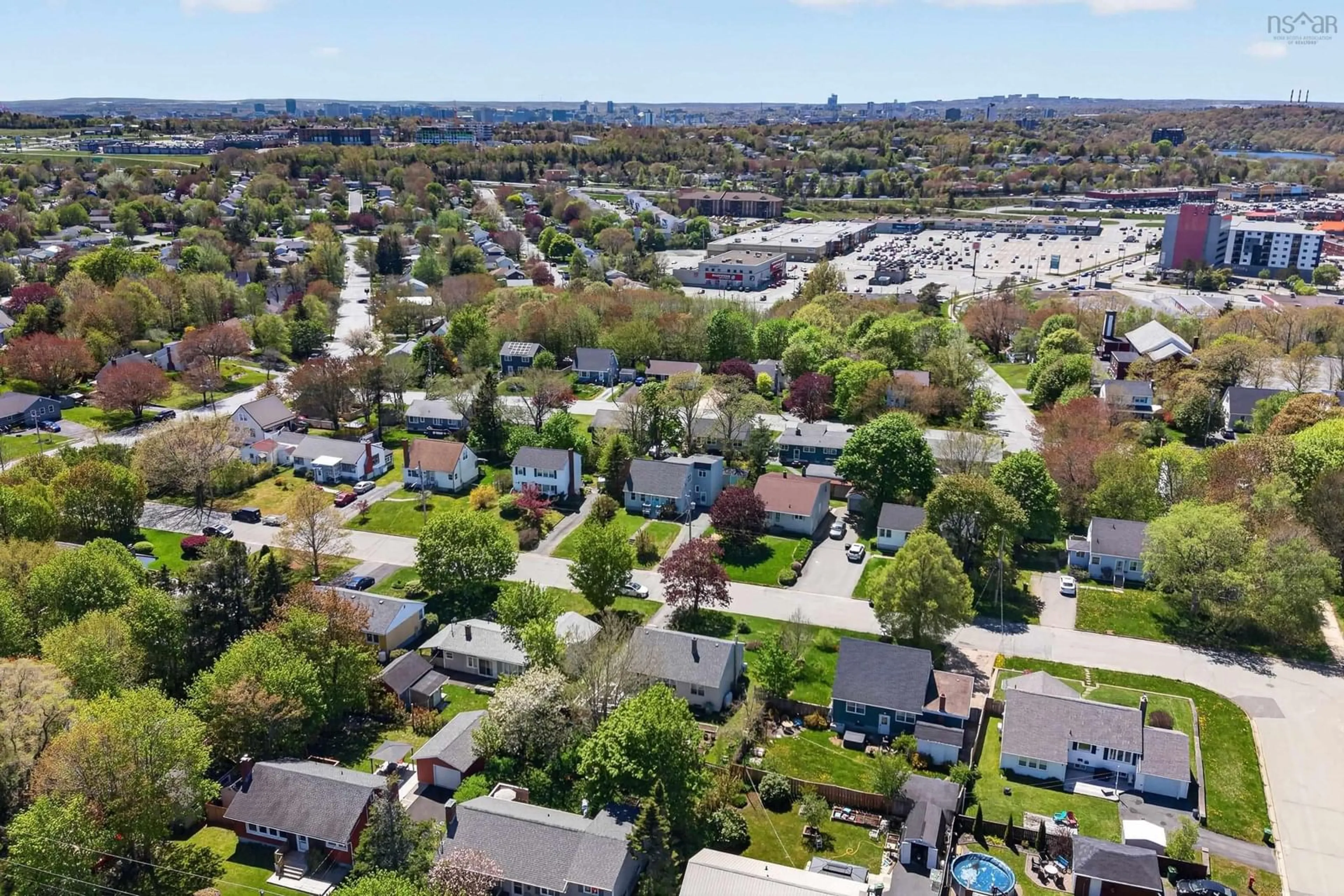 A pic from outside/outdoor area/front of a property/back of a property/a pic from drone, street for 26 Margaree Pky, Dartmouth Nova Scotia B2W 1P9