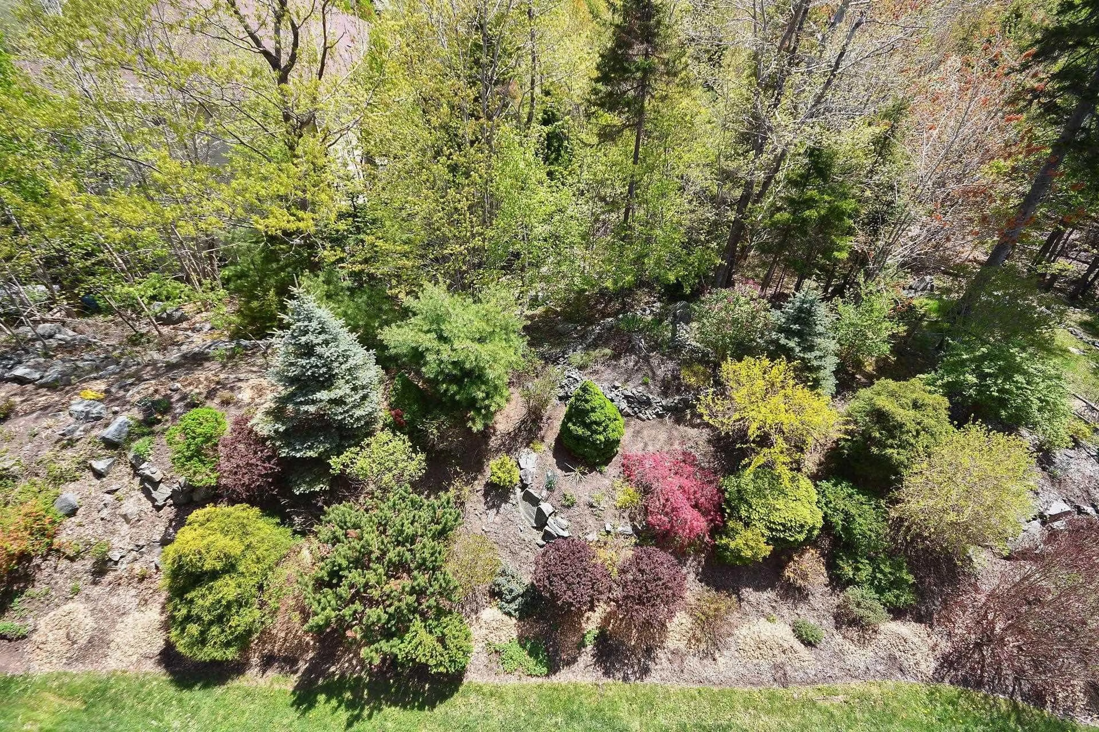 A pic from outside/outdoor area/front of a property/back of a property/a pic from drone, forest/trees view for 416-50 Nelsons Landing Blvd, Halifax Nova Scotia B4A 4K3