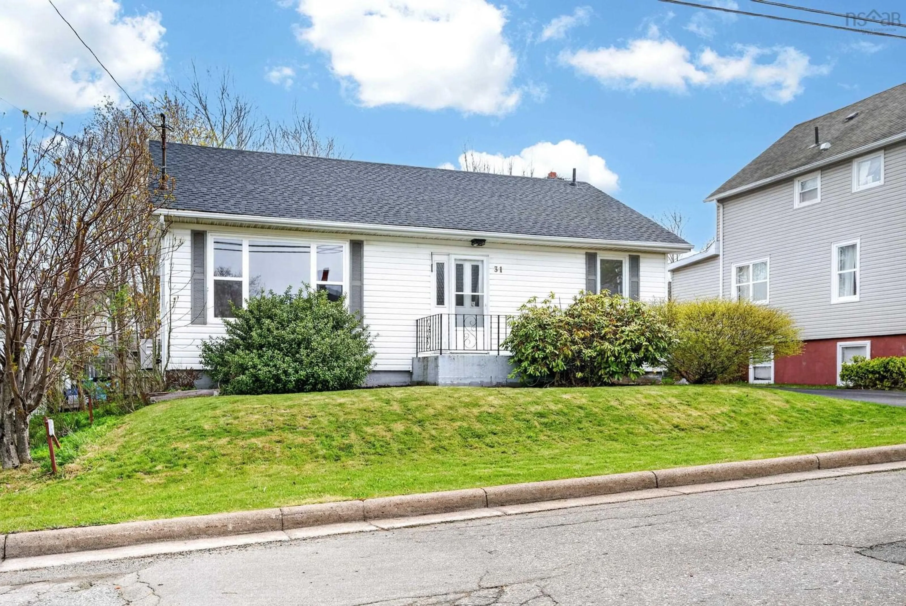 Home with vinyl exterior material, street for 31 Kent Street, Sydney Nova Scotia B1S 2X7
