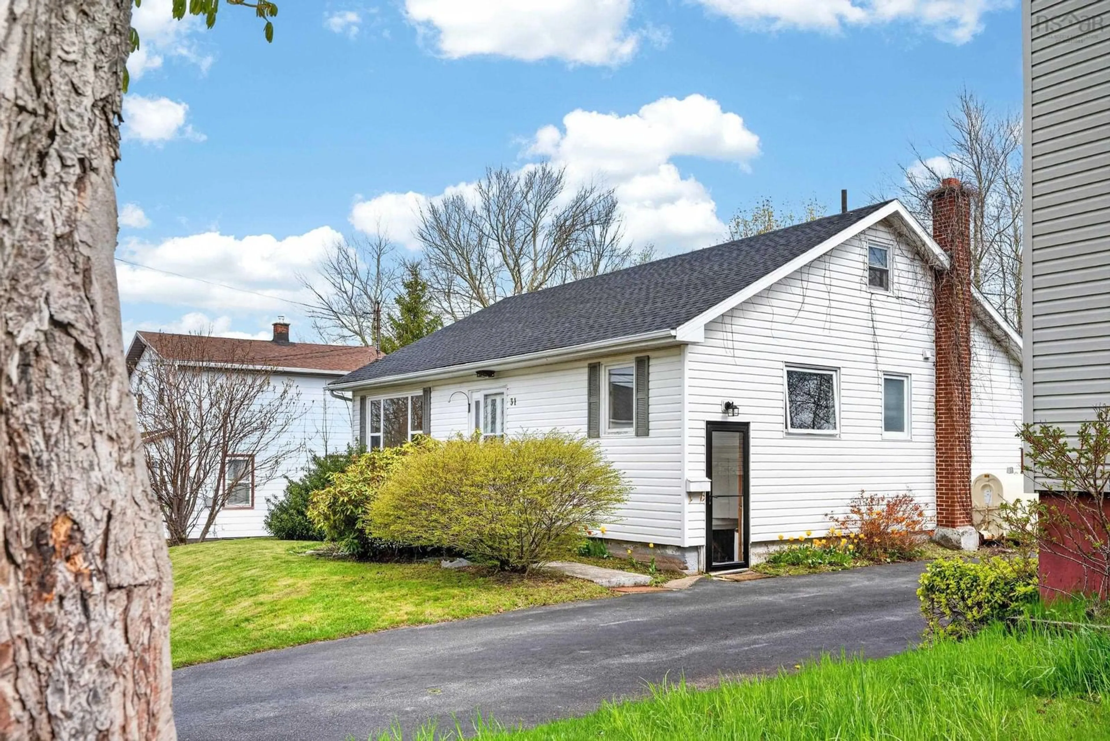 Home with vinyl exterior material, street for 31 Kent Street, Sydney Nova Scotia B1S 2X7
