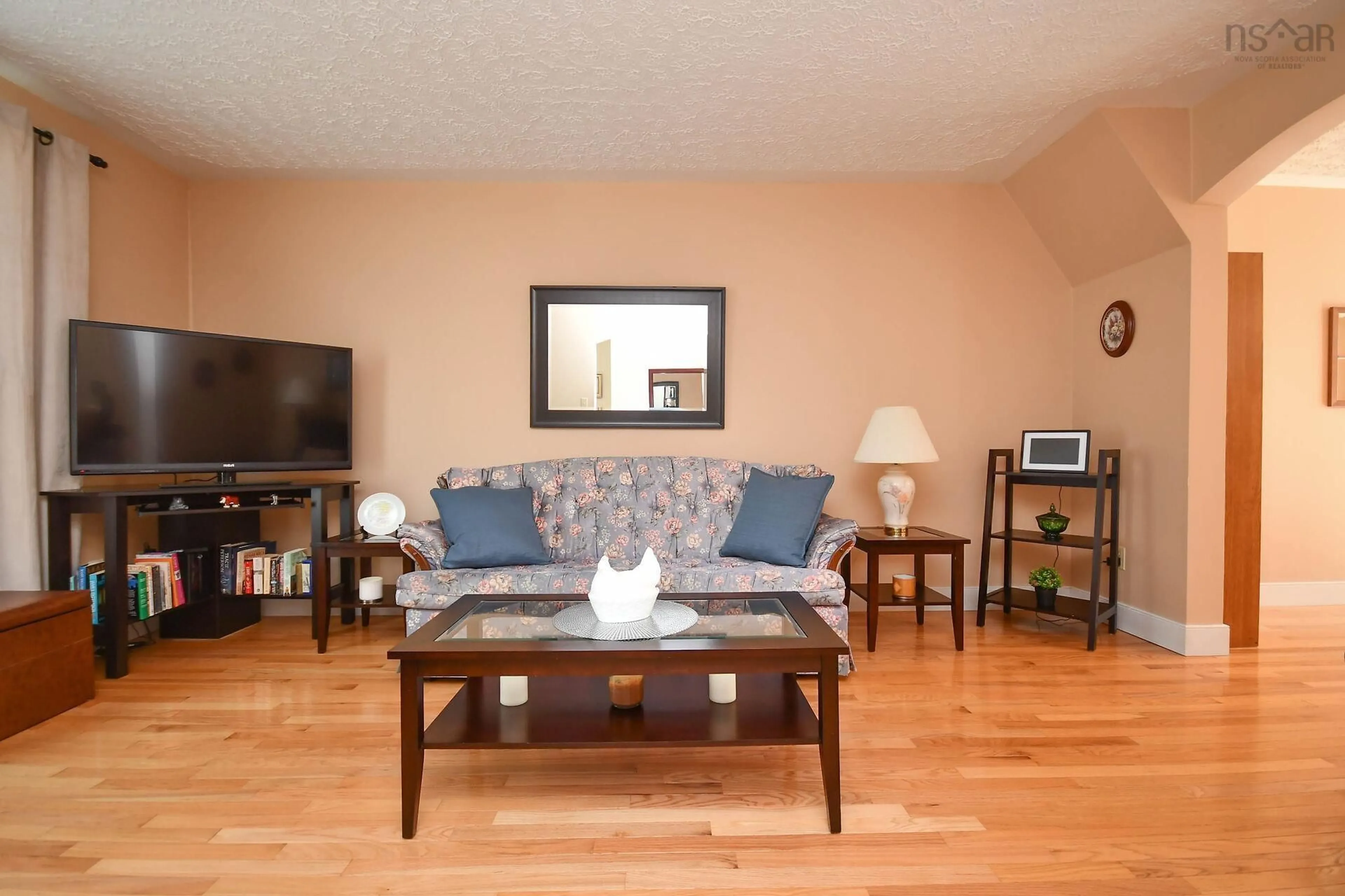 Living room with furniture, wood/laminate floor for 47 Smokey Dr, Lower Sackville Nova Scotia B4C 3B5