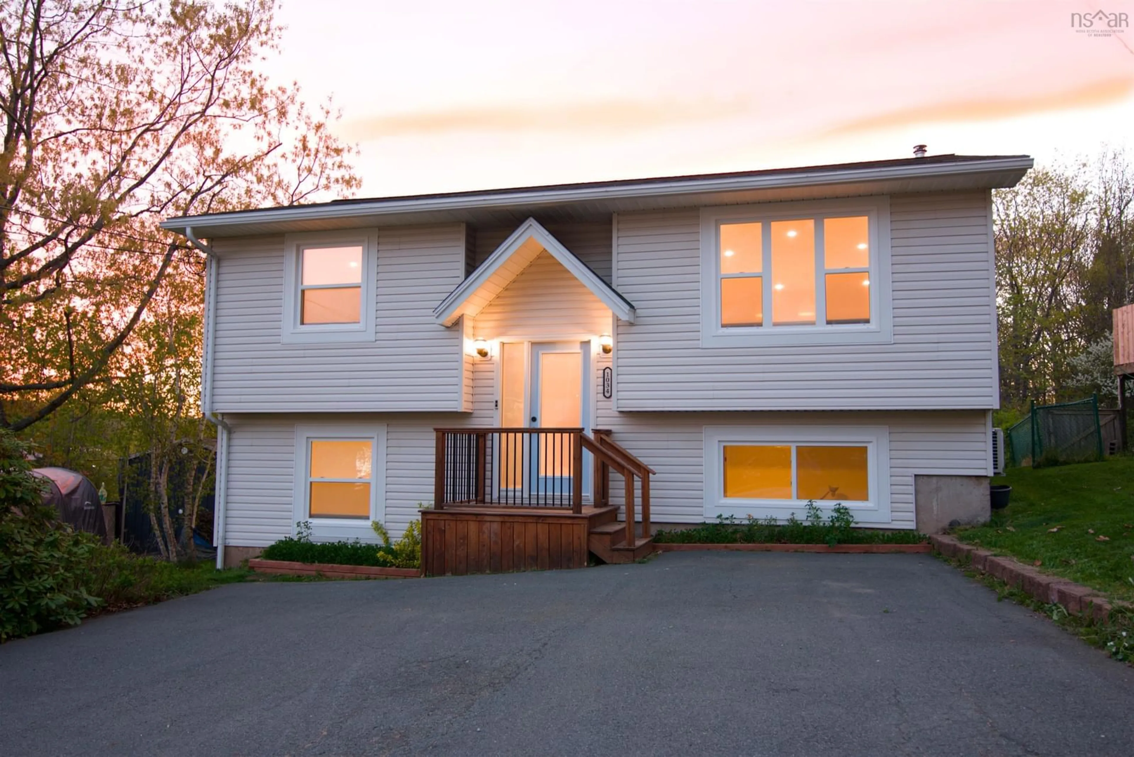 Home with vinyl exterior material, street for 1034 Riverside Dr, Lower Sackville Nova Scotia B4C 1B4