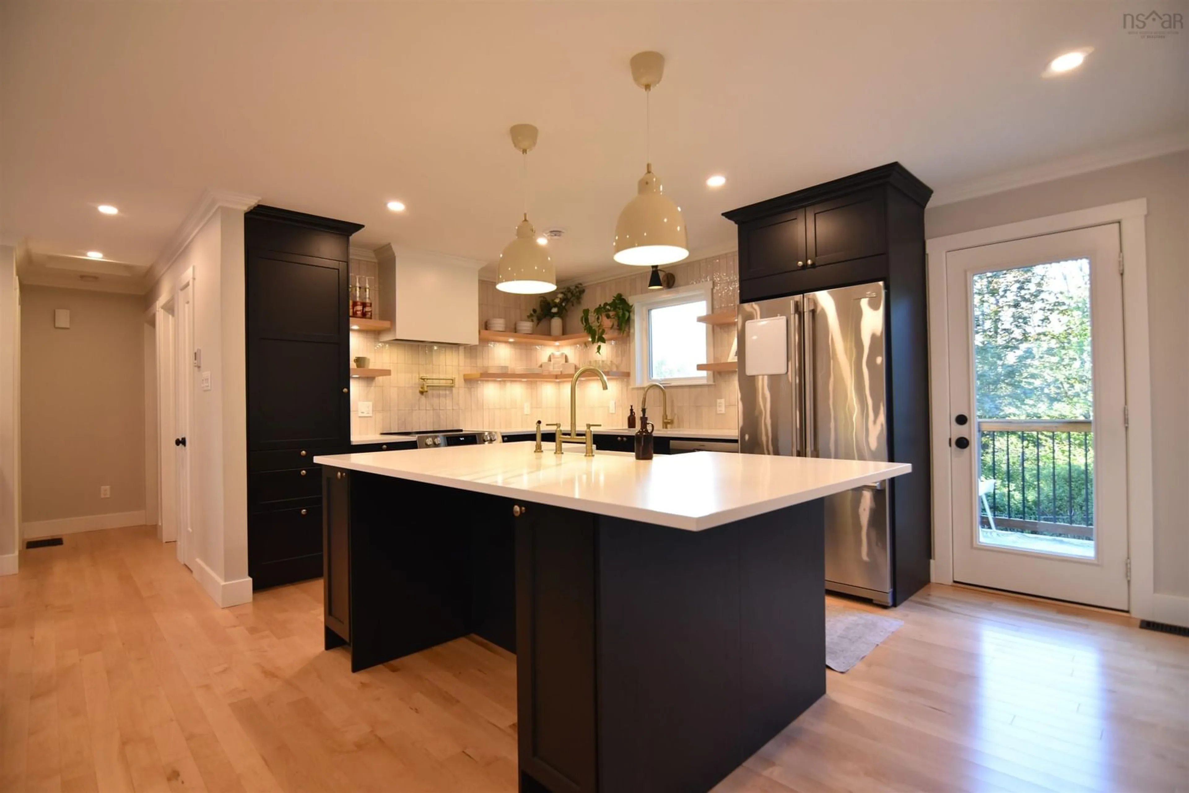 Contemporary kitchen, wood/laminate floor for 1034 Riverside Dr, Lower Sackville Nova Scotia B4C 1B4