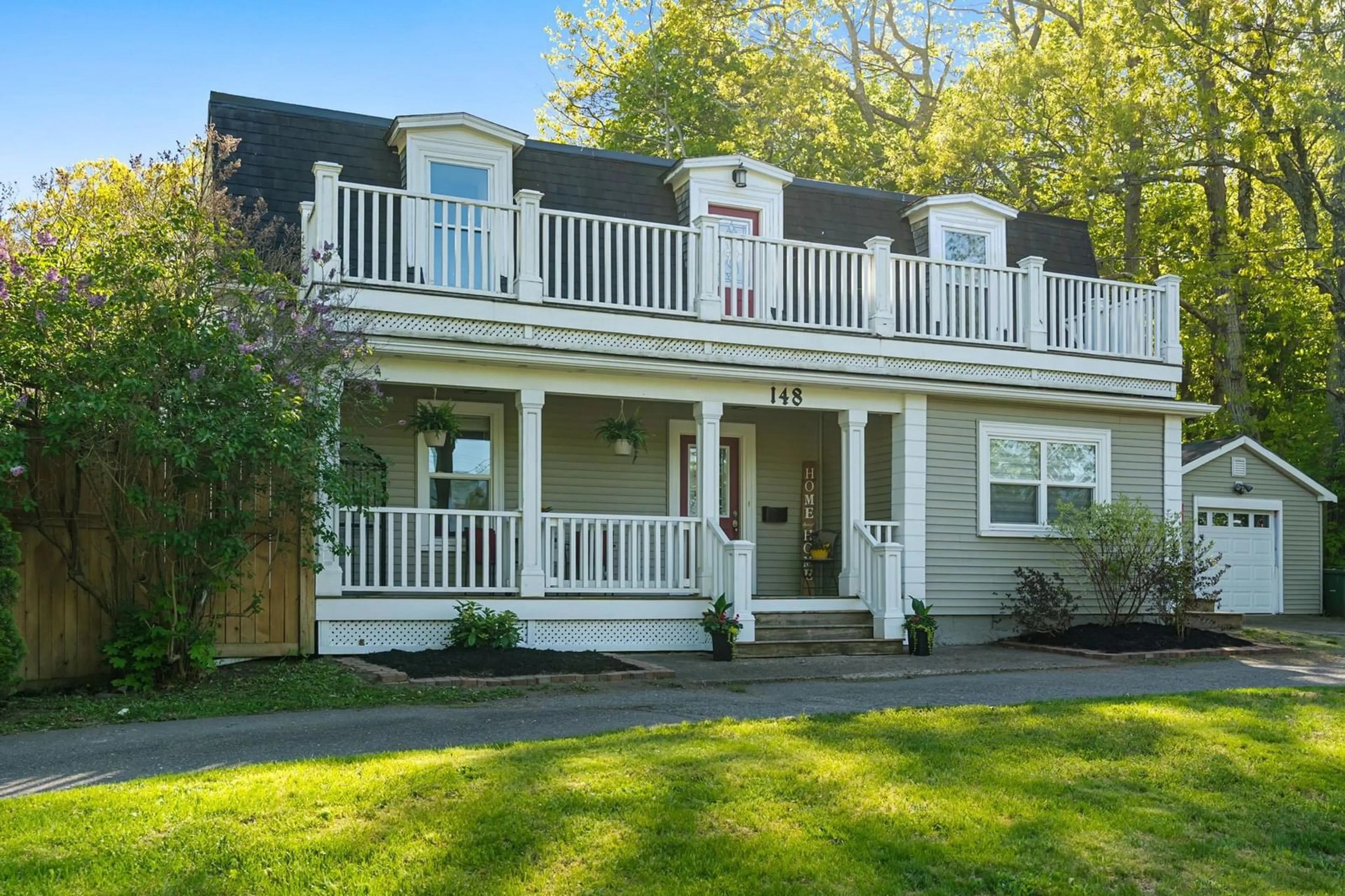 Home with vinyl exterior material, street for 148 Main St, Kentville Nova Scotia B4N 1J8