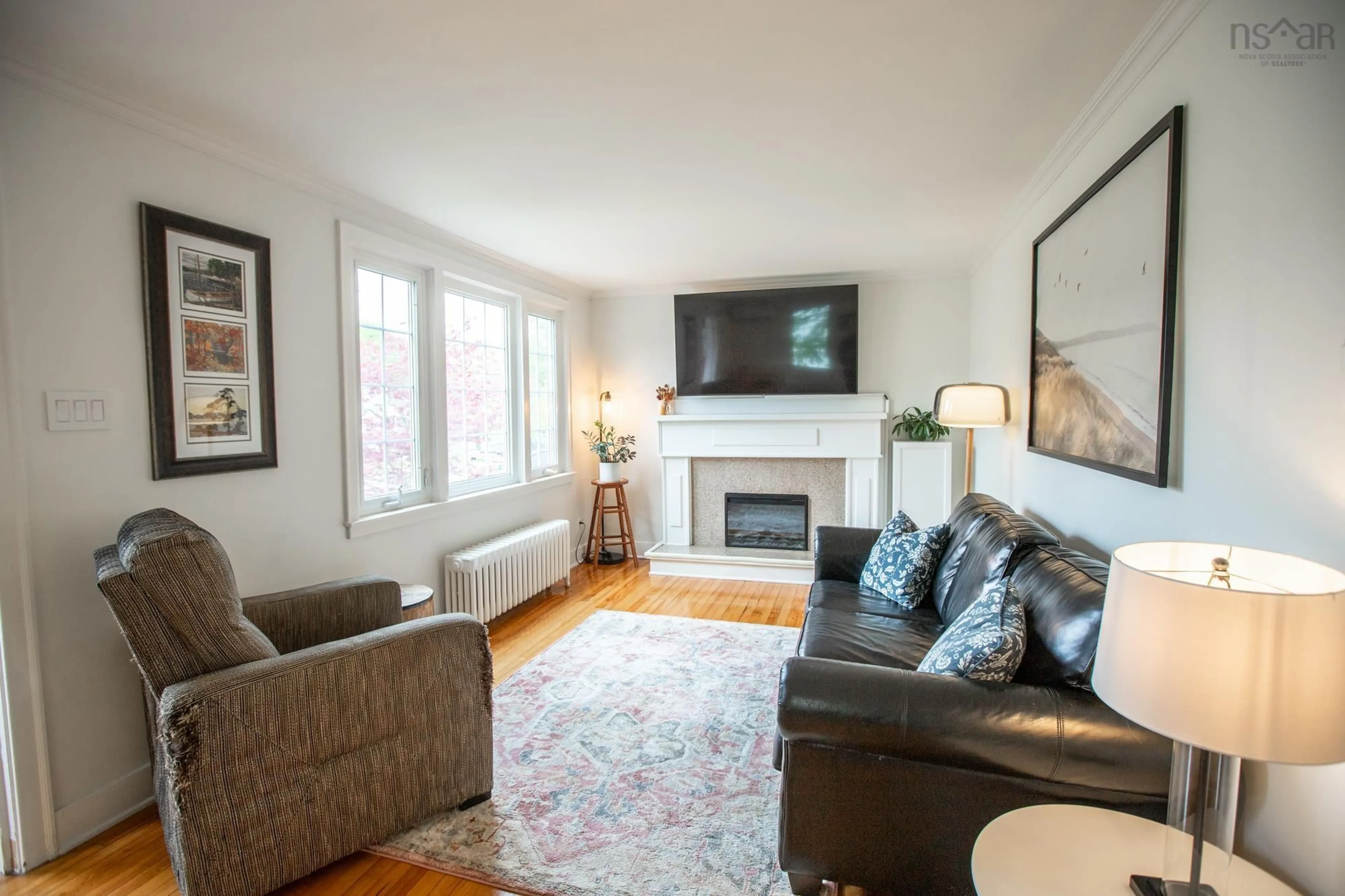 Living room with furniture, wood/laminate floor for 30 Central Ave, Fairview Nova Scotia B3N 2H4