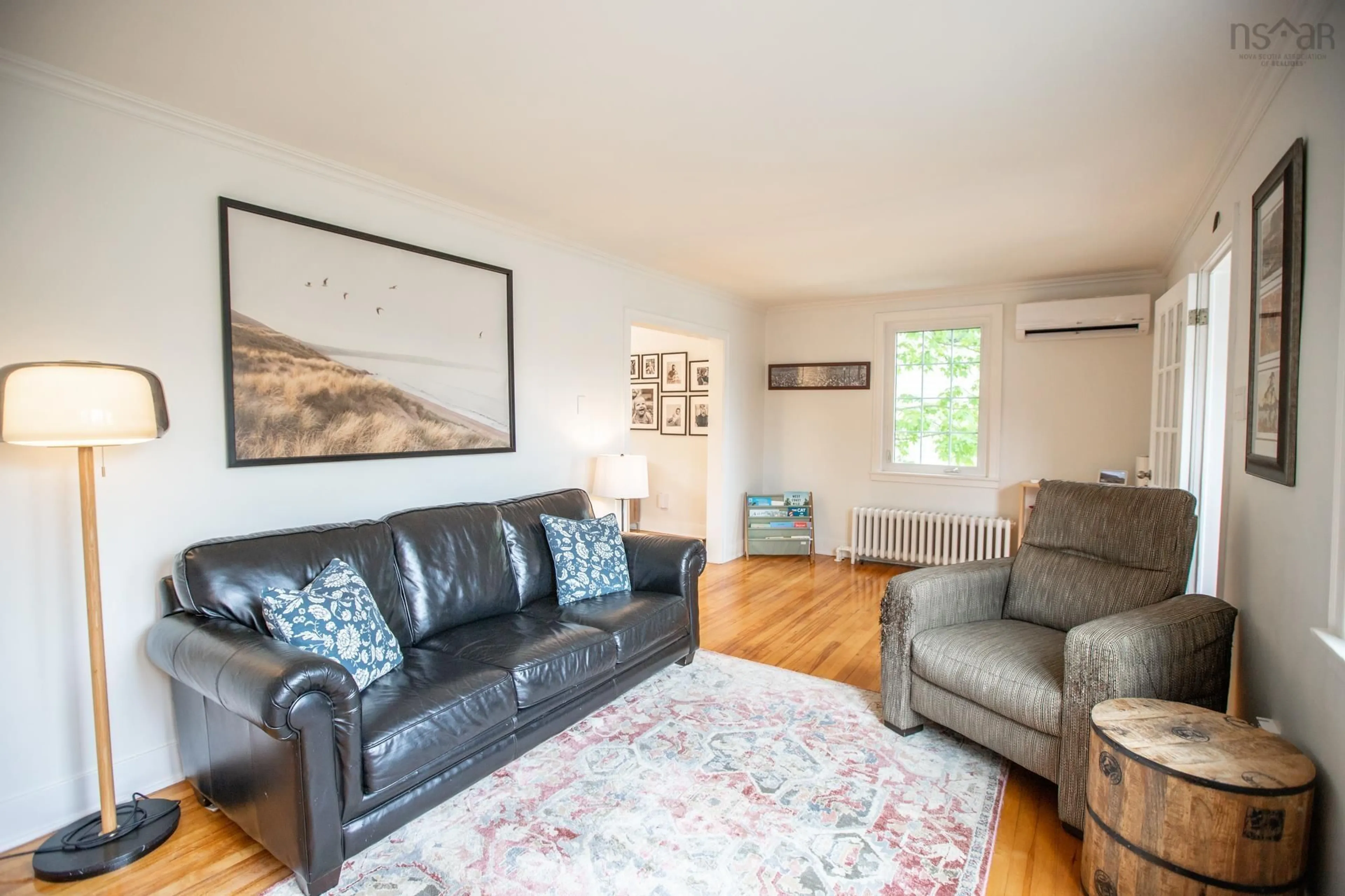Living room with furniture, wood/laminate floor for 30 Central Ave, Fairview Nova Scotia B3N 2H4