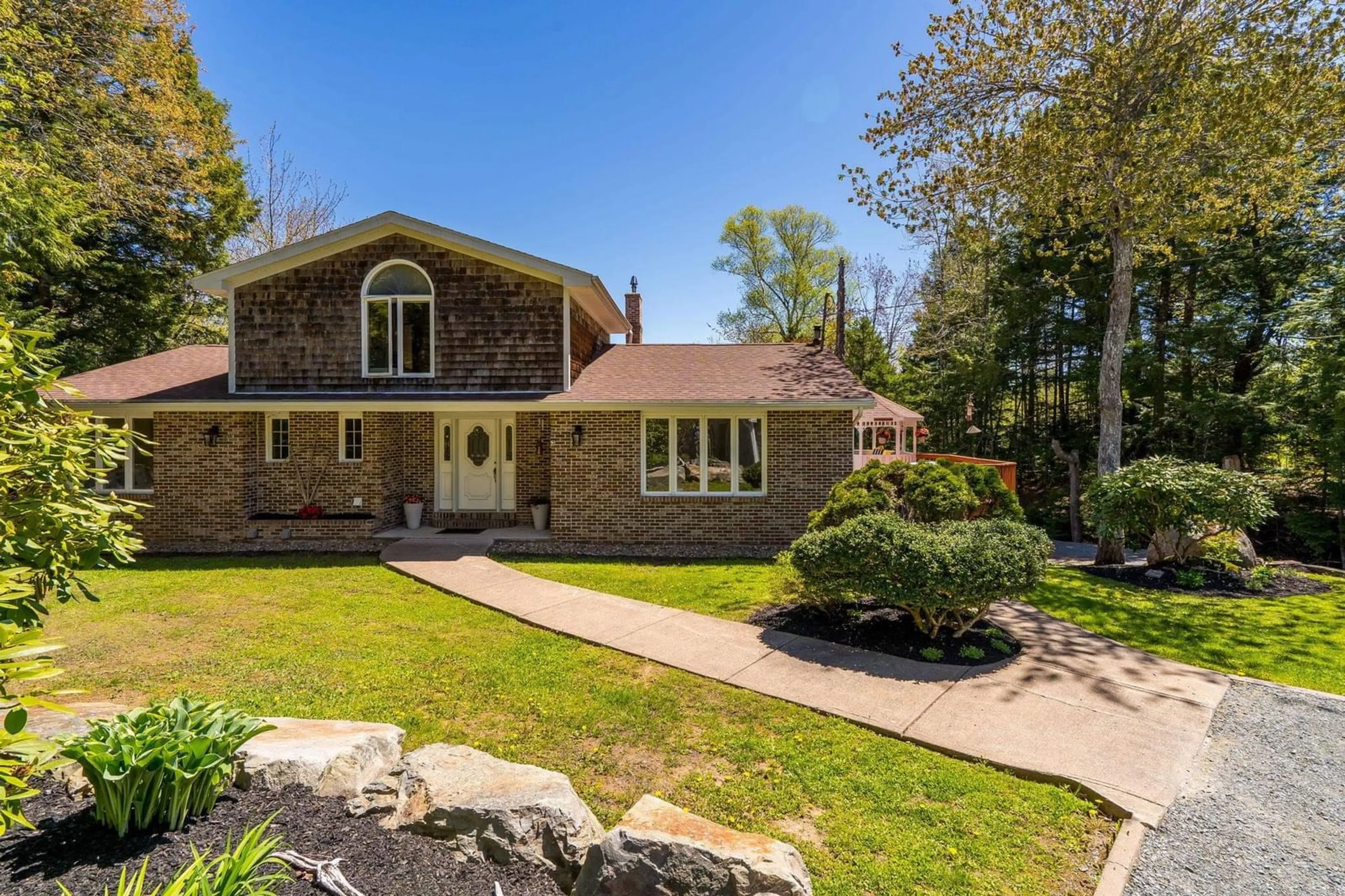 Home with brick exterior material, street for 1415 Myra Rd, Porters Lake Nova Scotia B3E 1G9