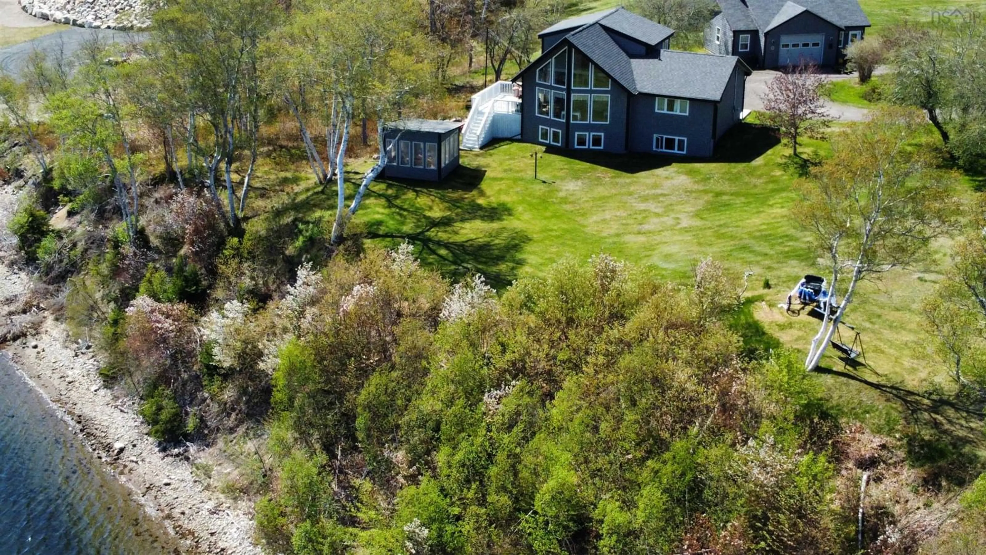 A pic from outside/outdoor area/front of a property/back of a property/a pic from drone, water/lake/river/ocean view for 16147 316 Hwy, Country Harbour Mines Nova Scotia B0H 1J0