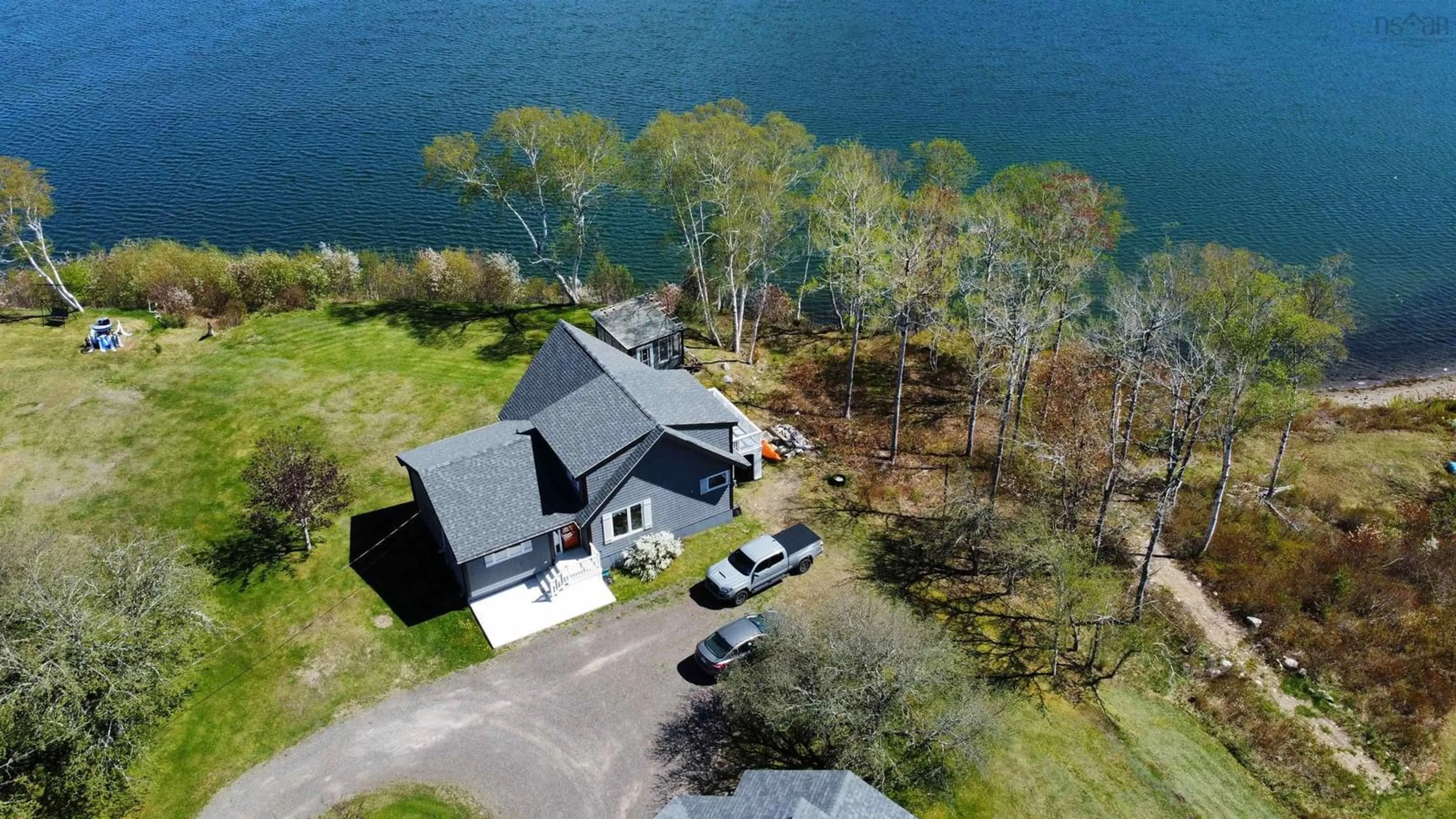 A pic from outside/outdoor area/front of a property/back of a property/a pic from drone, water/lake/river/ocean view for 16147 316 Hwy, Country Harbour Mines Nova Scotia B0H 1J0