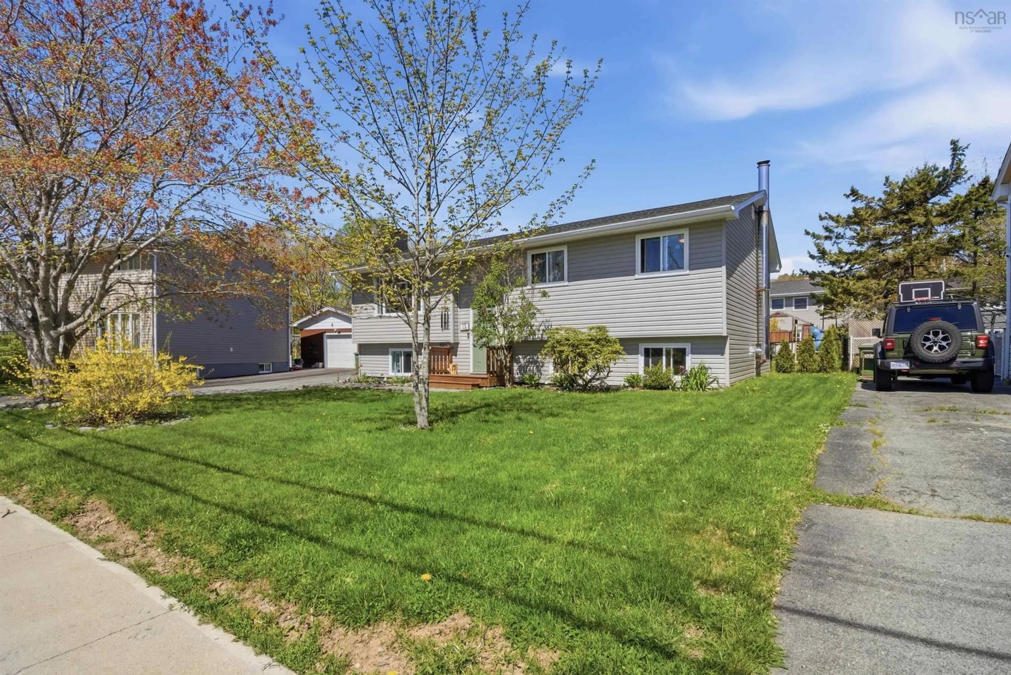 Home with vinyl exterior material, street for 15 Owen Dr, Dartmouth Nova Scotia B2W 3M1