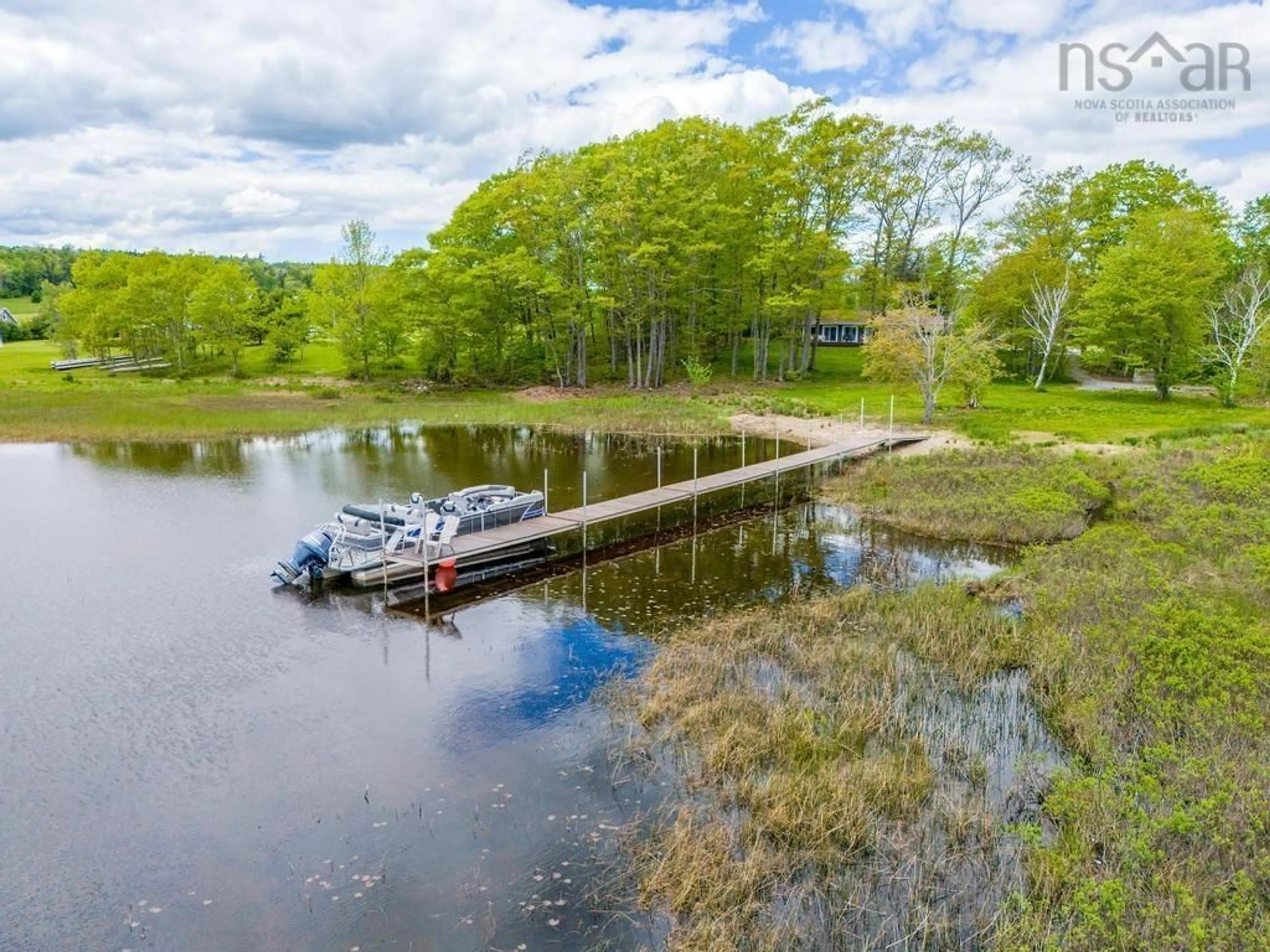 A pic from outside/outdoor area/front of a property/back of a property/a pic from drone, water/lake/river/ocean view for 40 Martins Point Rd, Enfield Nova Scotia B2T 1H9