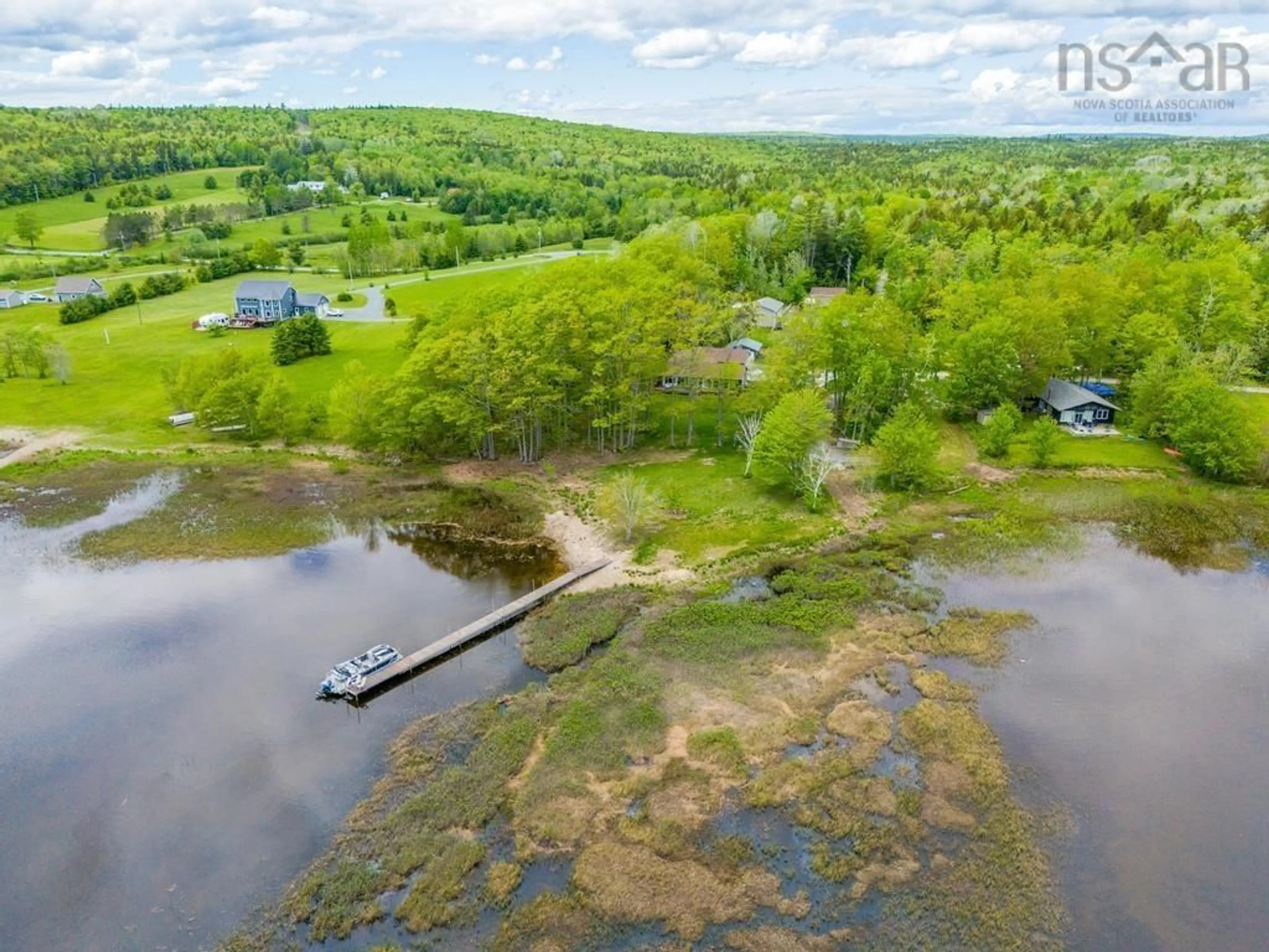A pic from outside/outdoor area/front of a property/back of a property/a pic from drone, water/lake/river/ocean view for 40 Martins Point Rd, Enfield Nova Scotia B2T 1H9
