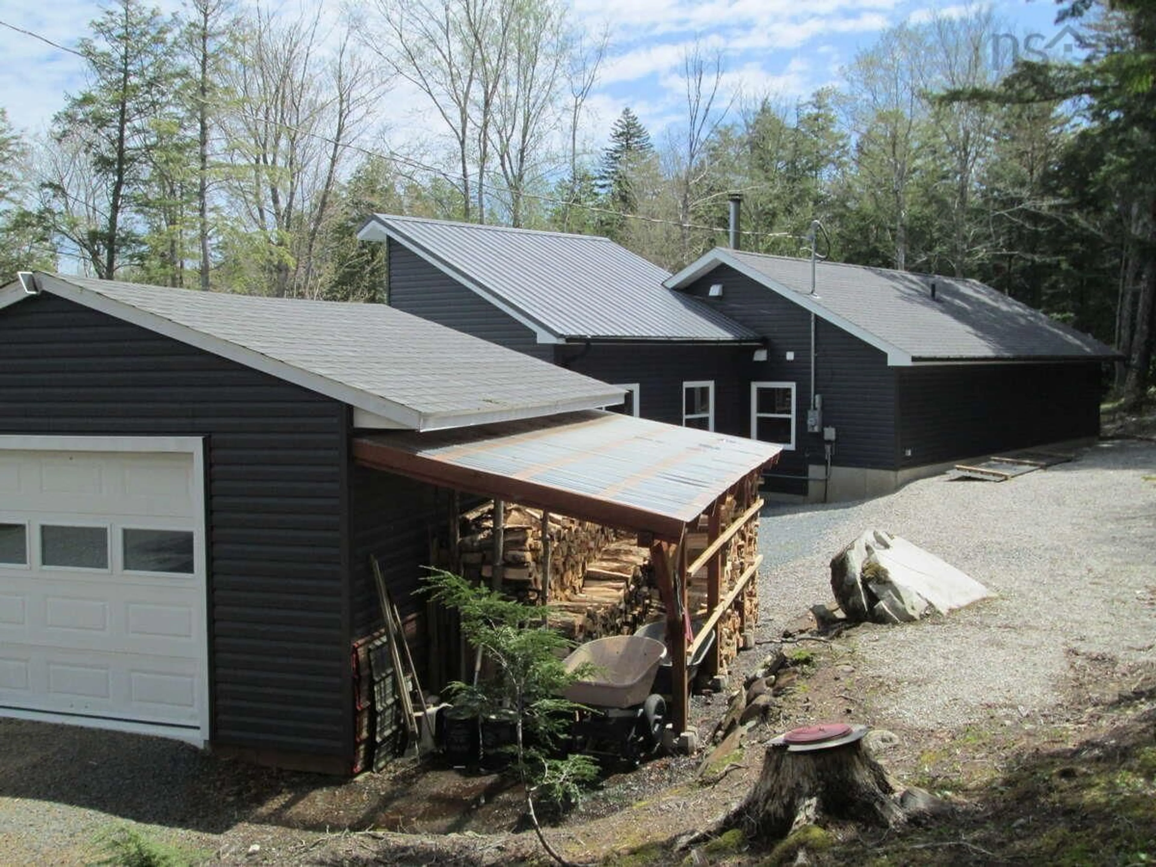 A pic from outside/outdoor area/front of a property/back of a property/a pic from drone, unknown for 227 Somerset Rd, Italy Cross Nova Scotia B4V 0M1