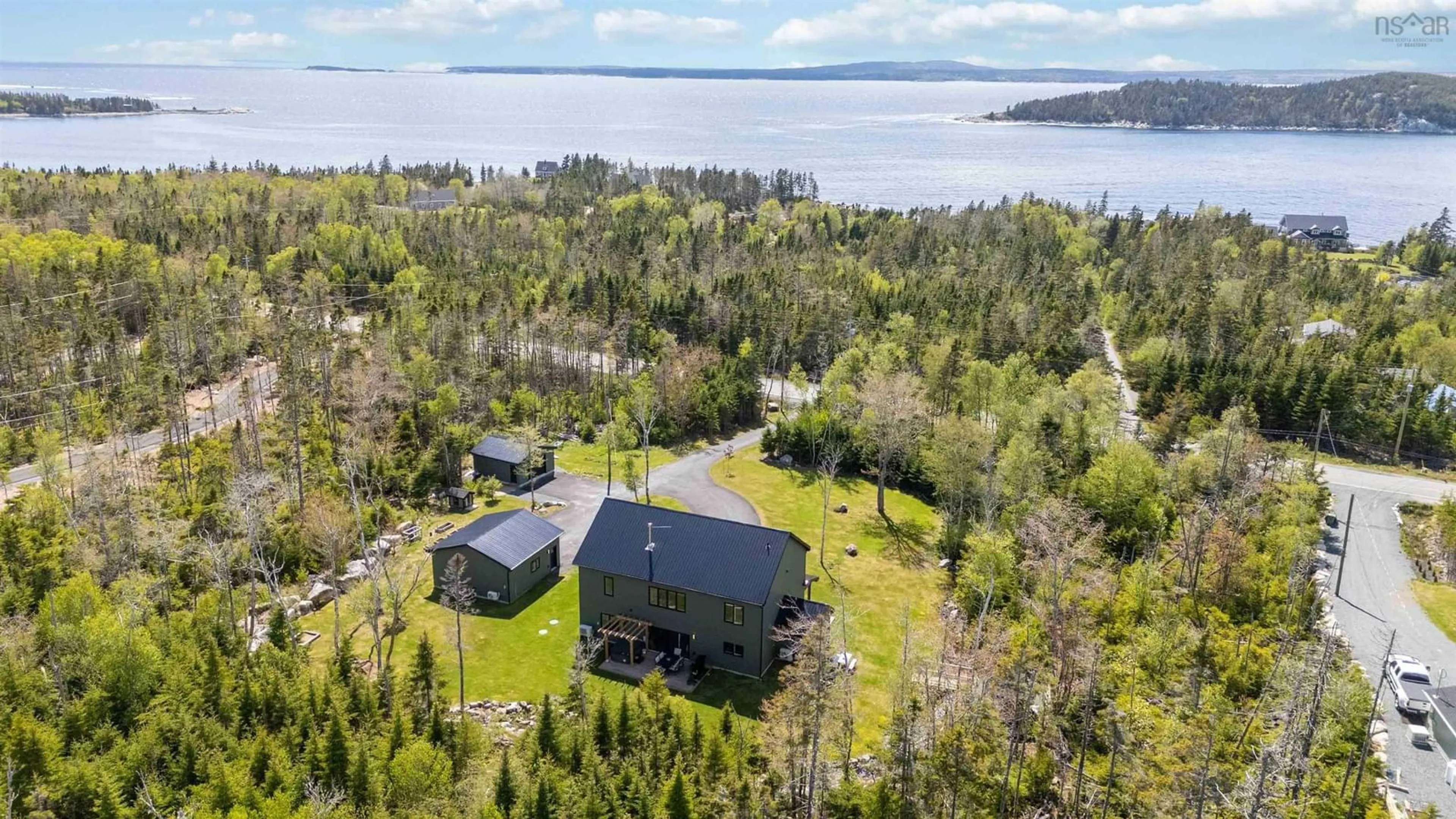 A pic from outside/outdoor area/front of a property/back of a property/a pic from drone, water/lake/river/ocean view for 9279 Peggys Cove Rd, Hacketts Cove Nova Scotia B3Z 0T7