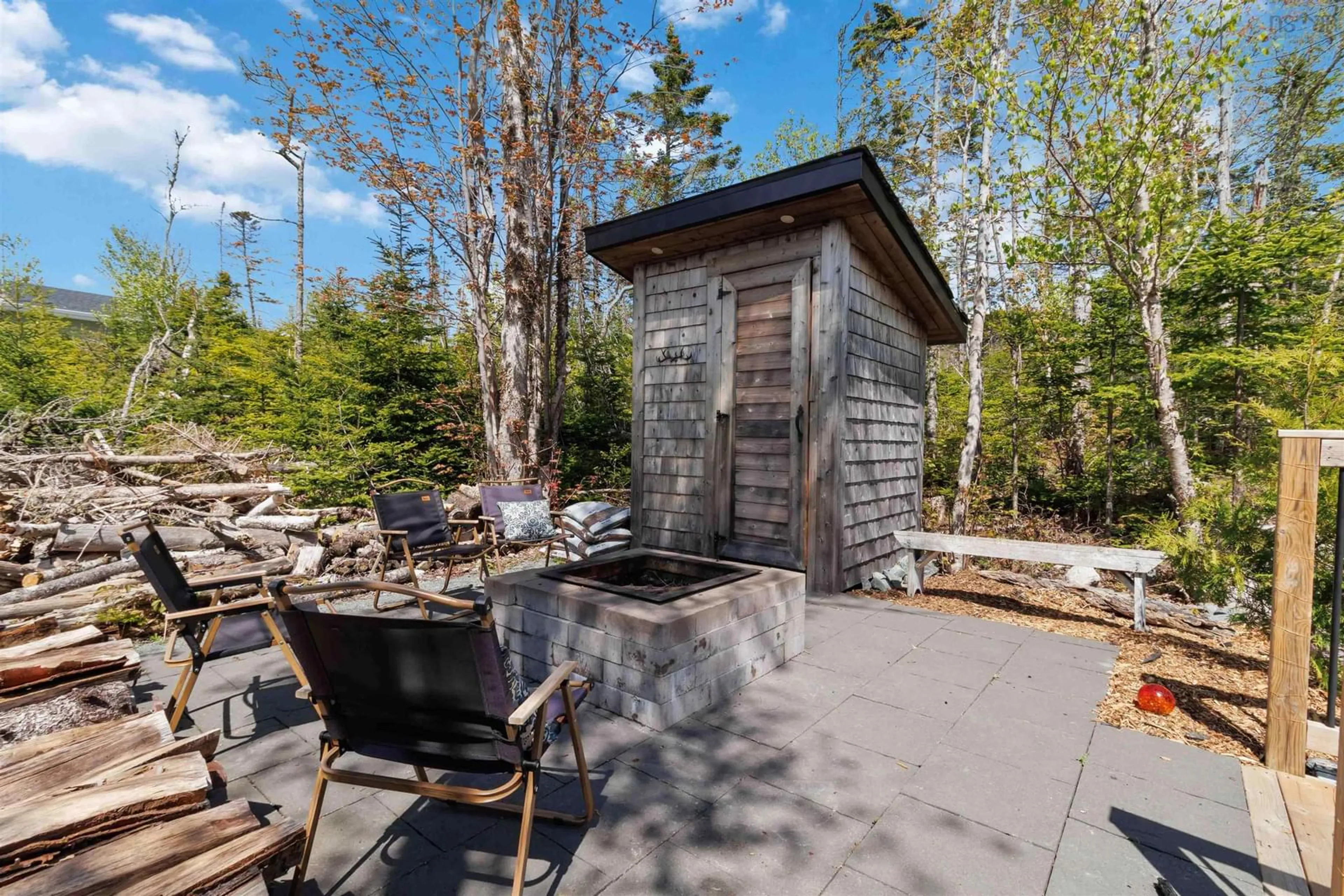 Patio, forest/trees view for 9279 Peggys Cove Rd, Hacketts Cove Nova Scotia B3Z 0T7