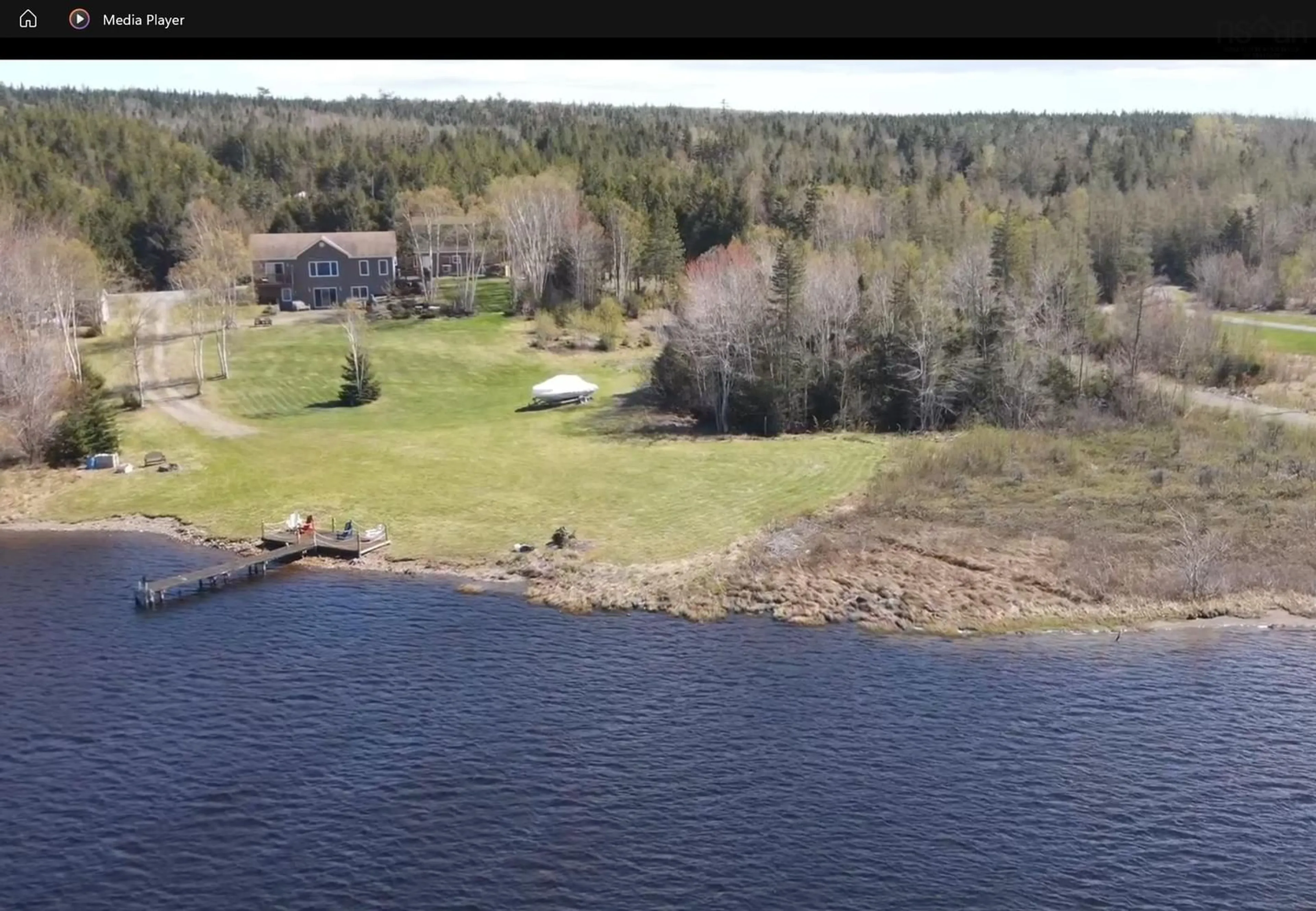 A pic from outside/outdoor area/front of a property/back of a property/a pic from drone, water/lake/river/ocean view for 448 Grand Mira South Rd Rd, Juniper Mountain Nova Scotia B1K 1G2