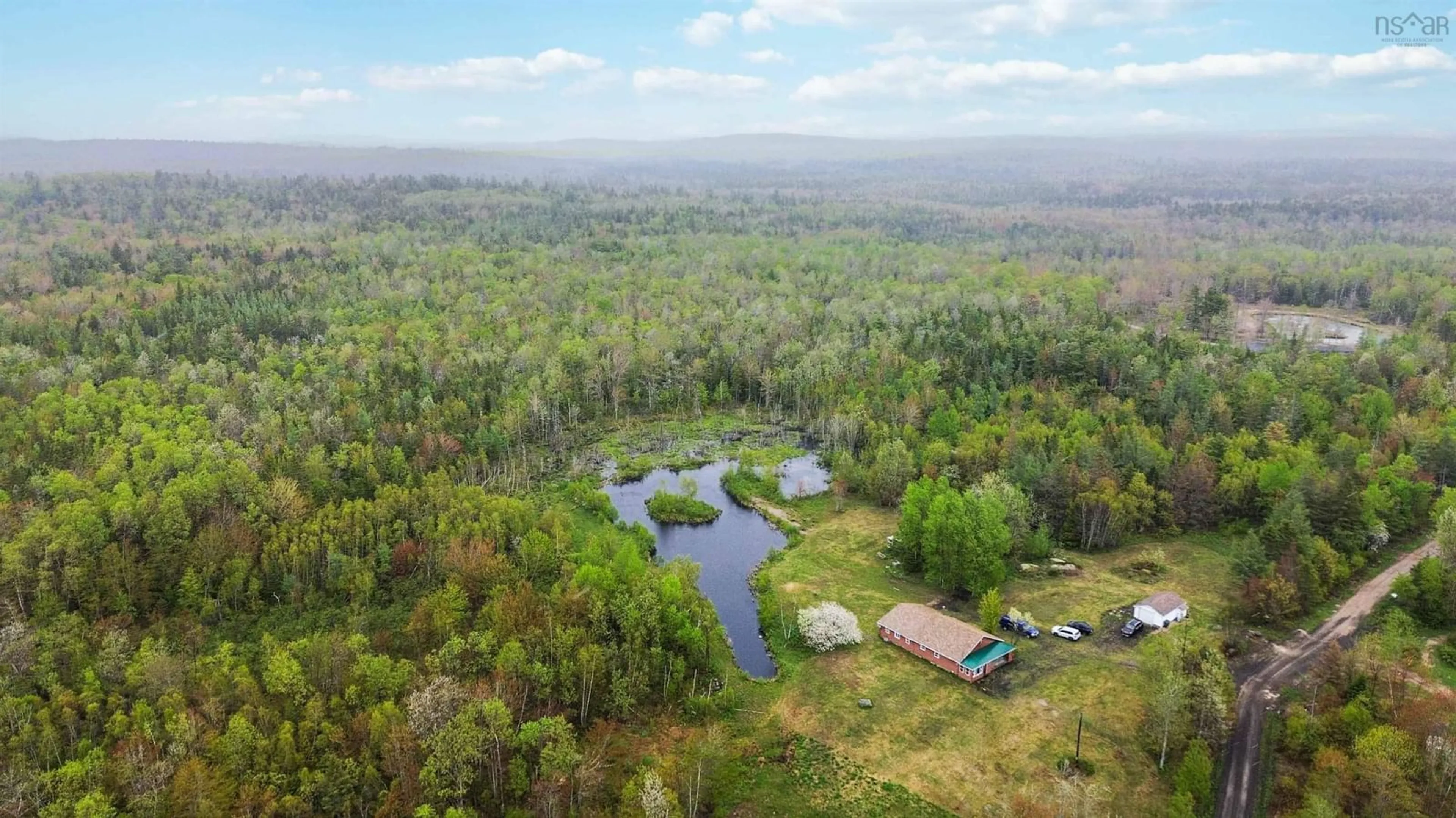 A pic from outside/outdoor area/front of a property/back of a property/a pic from drone, water/lake/river/ocean view for 4272 Thorne Rd, West Dalhousie Nova Scotia B0S 1C0