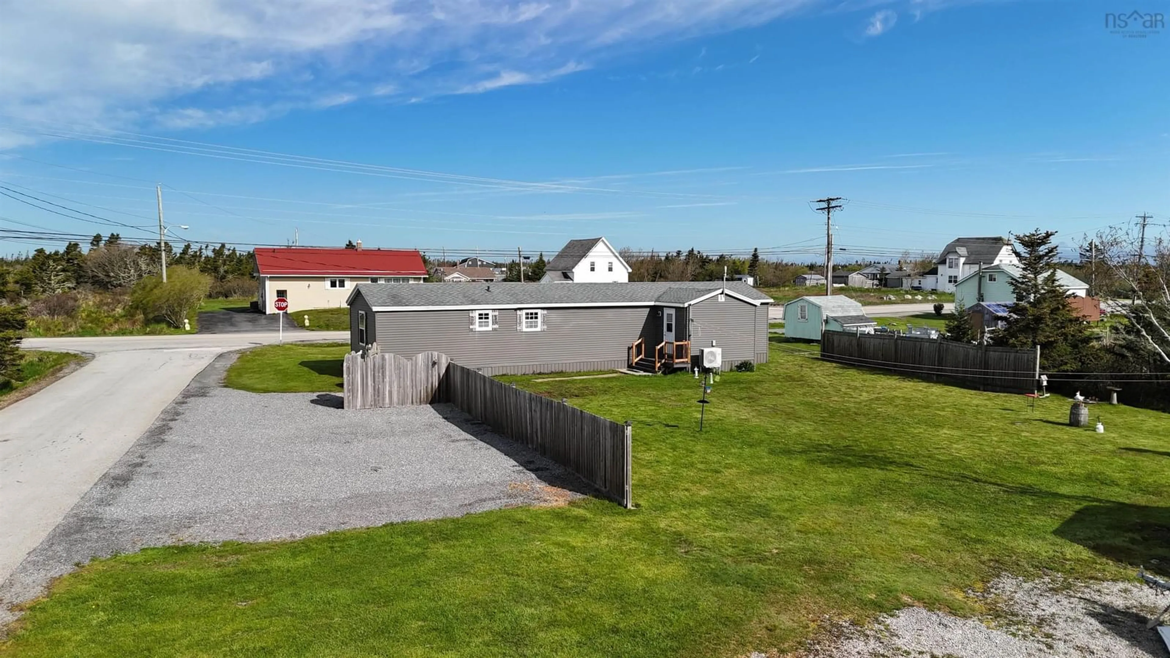 A pic from outside/outdoor area/front of a property/back of a property/a pic from drone, street for 5 Nickerson Rd, South Side Nova Scotia B0W 1P0