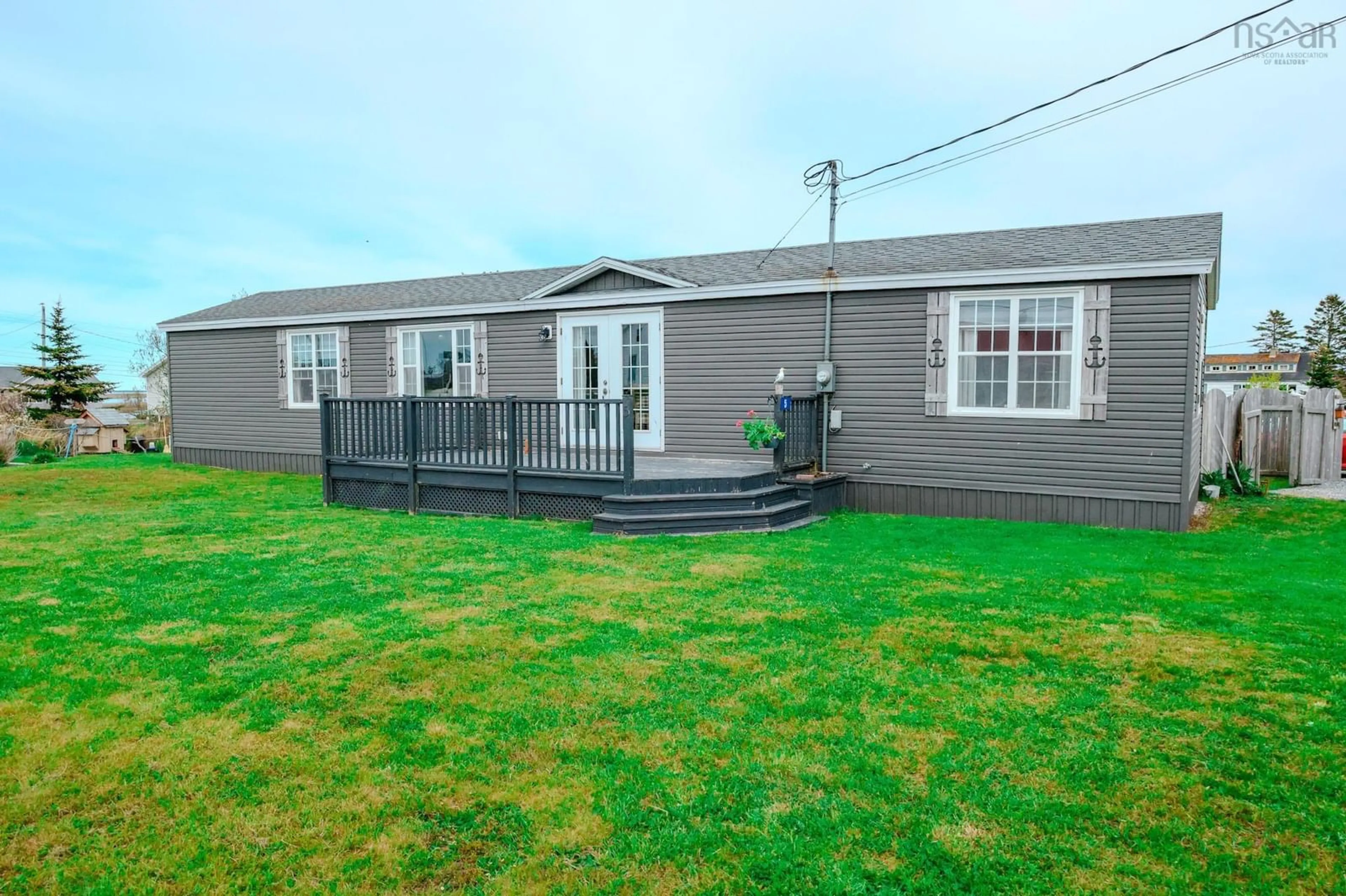 A pic from outside/outdoor area/front of a property/back of a property/a pic from drone, building for 5 Nickerson Rd, South Side Nova Scotia B0W 1P0
