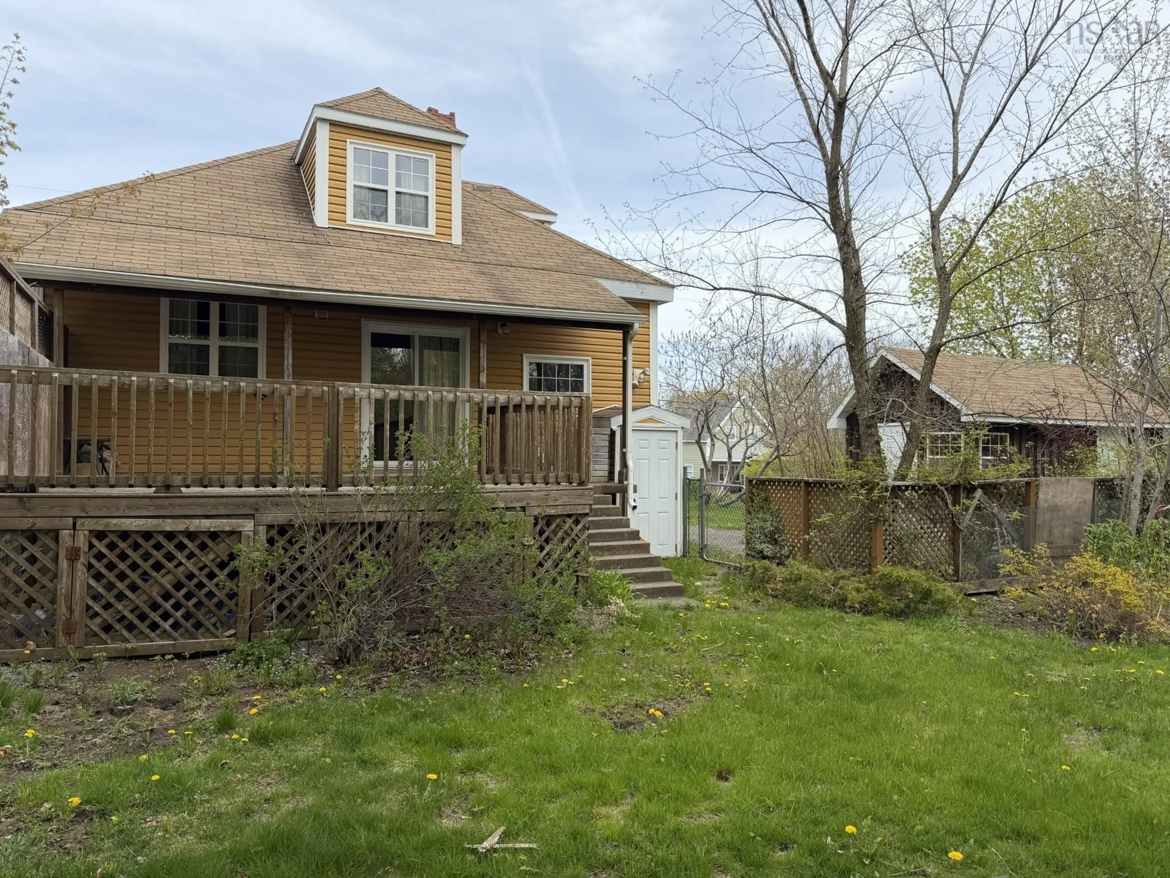 A pic from outside/outdoor area/front of a property/back of a property/a pic from drone, street for 128 Brook St, North Sydney Nova Scotia B2A 2K4