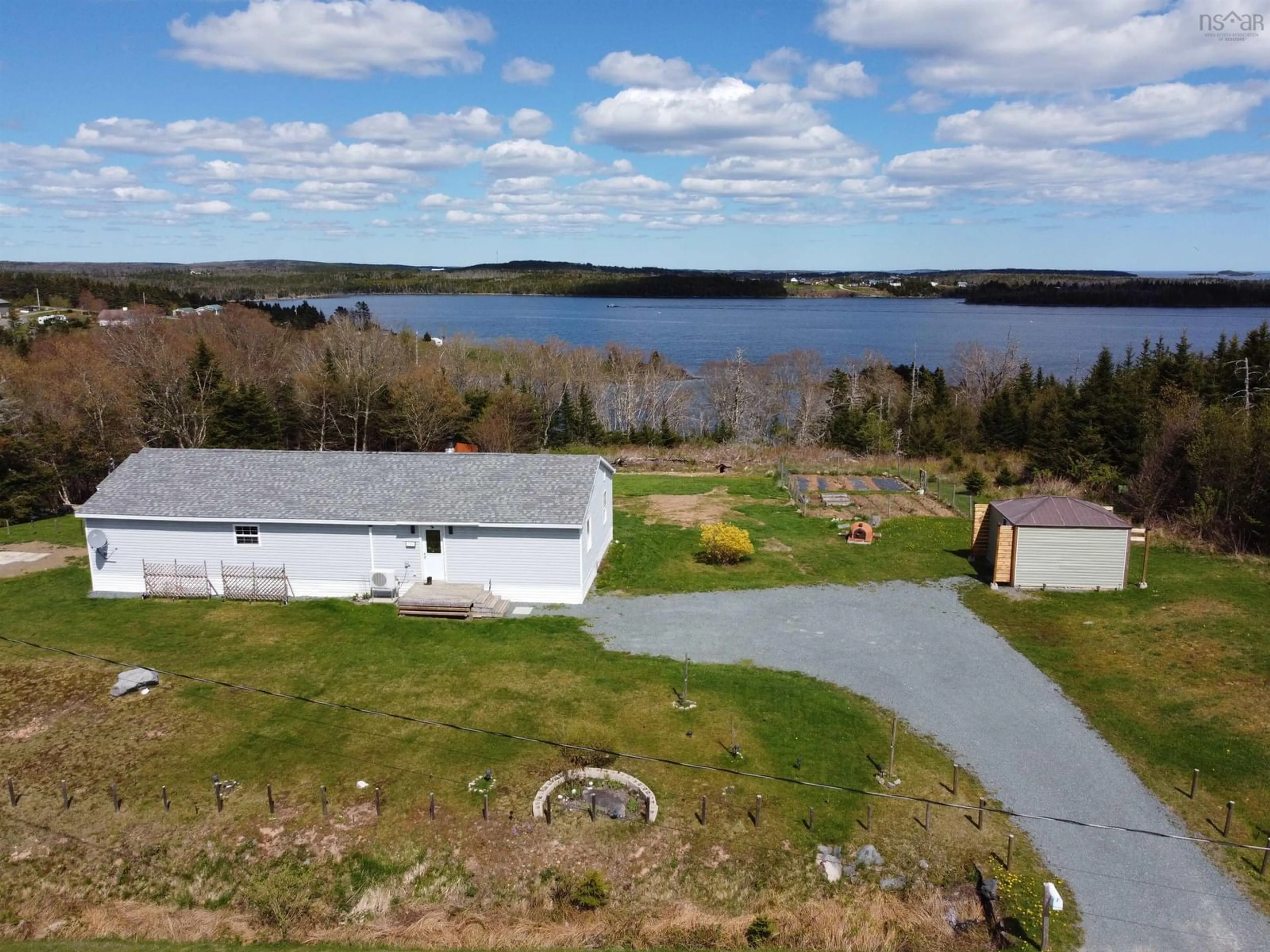 A pic from outside/outdoor area/front of a property/back of a property/a pic from drone, water/lake/river/ocean view for 101 Scrivens Rd, West Quoddy Nova Scotia B0J 2R0