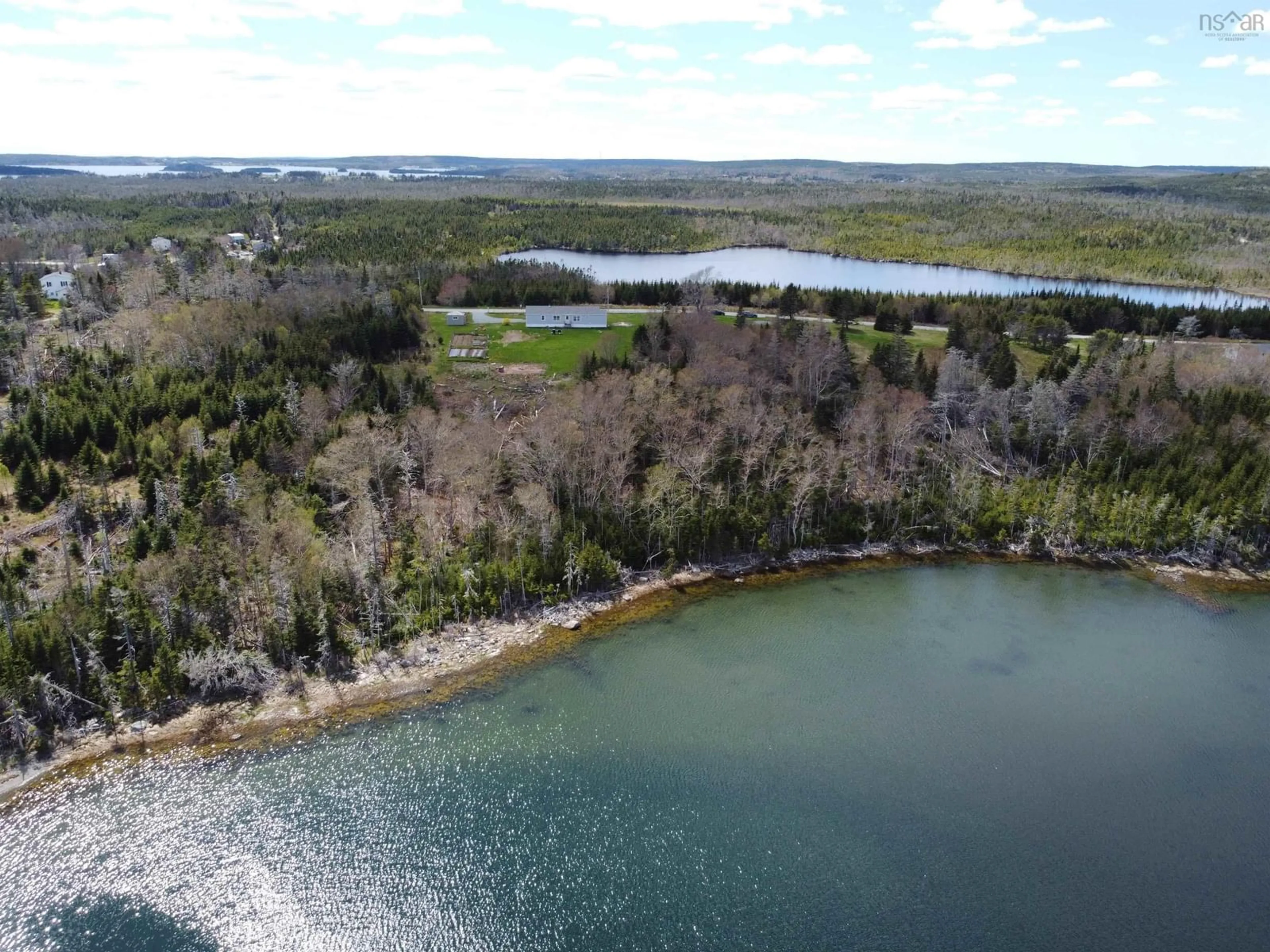 A pic from outside/outdoor area/front of a property/back of a property/a pic from drone, water/lake/river/ocean view for 101 Scrivens Rd, West Quoddy Nova Scotia B0J 2R0
