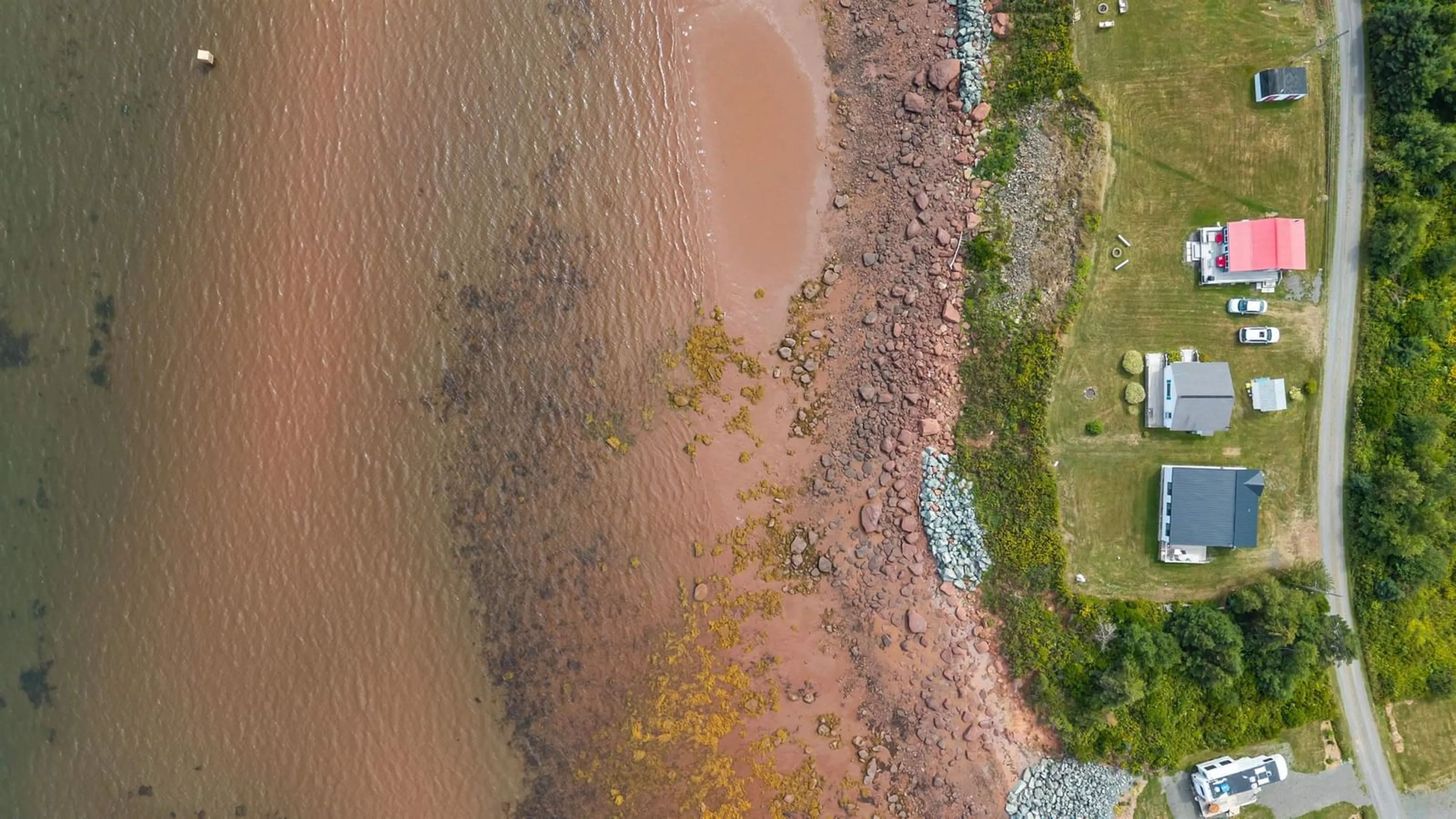 A pic from outside/outdoor area/front of a property/back of a property/a pic from drone, water/lake/river/ocean view for 130 Beach Rd, Port Howe Nova Scotia B0K 1L0