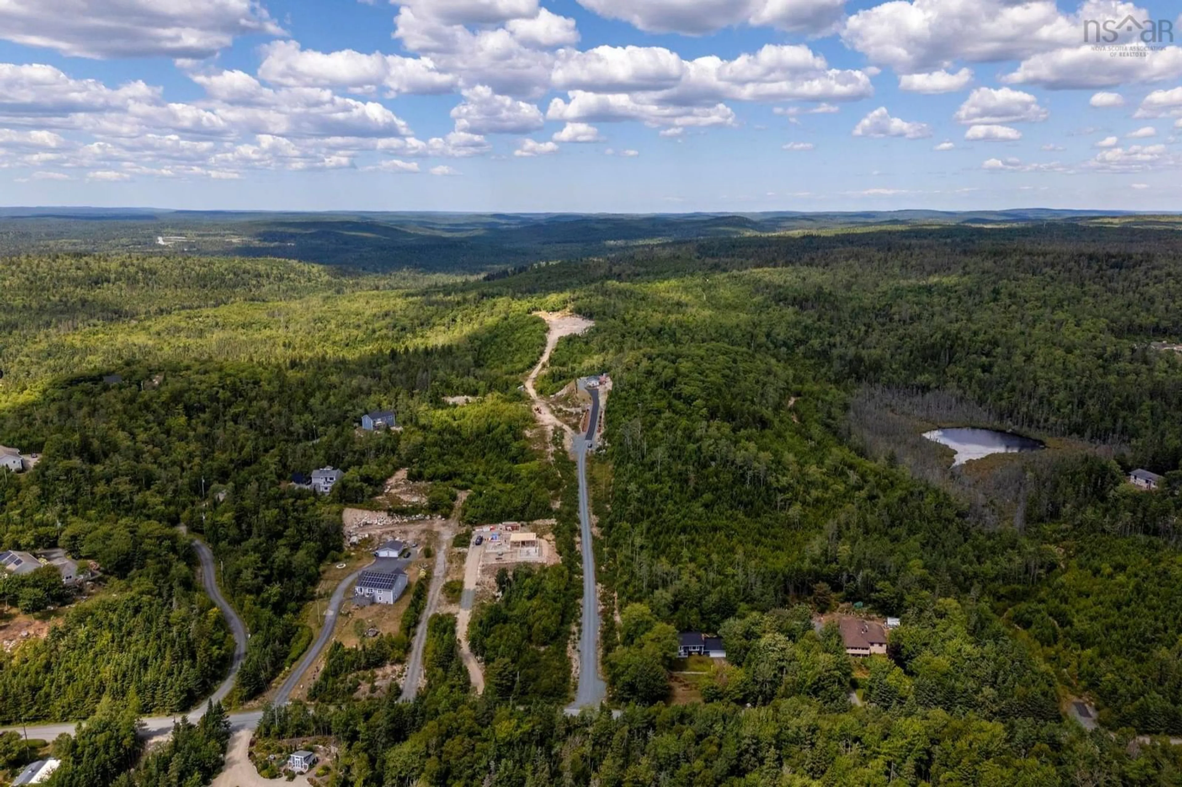 A pic from outside/outdoor area/front of a property/back of a property/a pic from drone, forest/trees view for 166 Hillside Dr, Boutiliers Point Nova Scotia B3Z 1W8