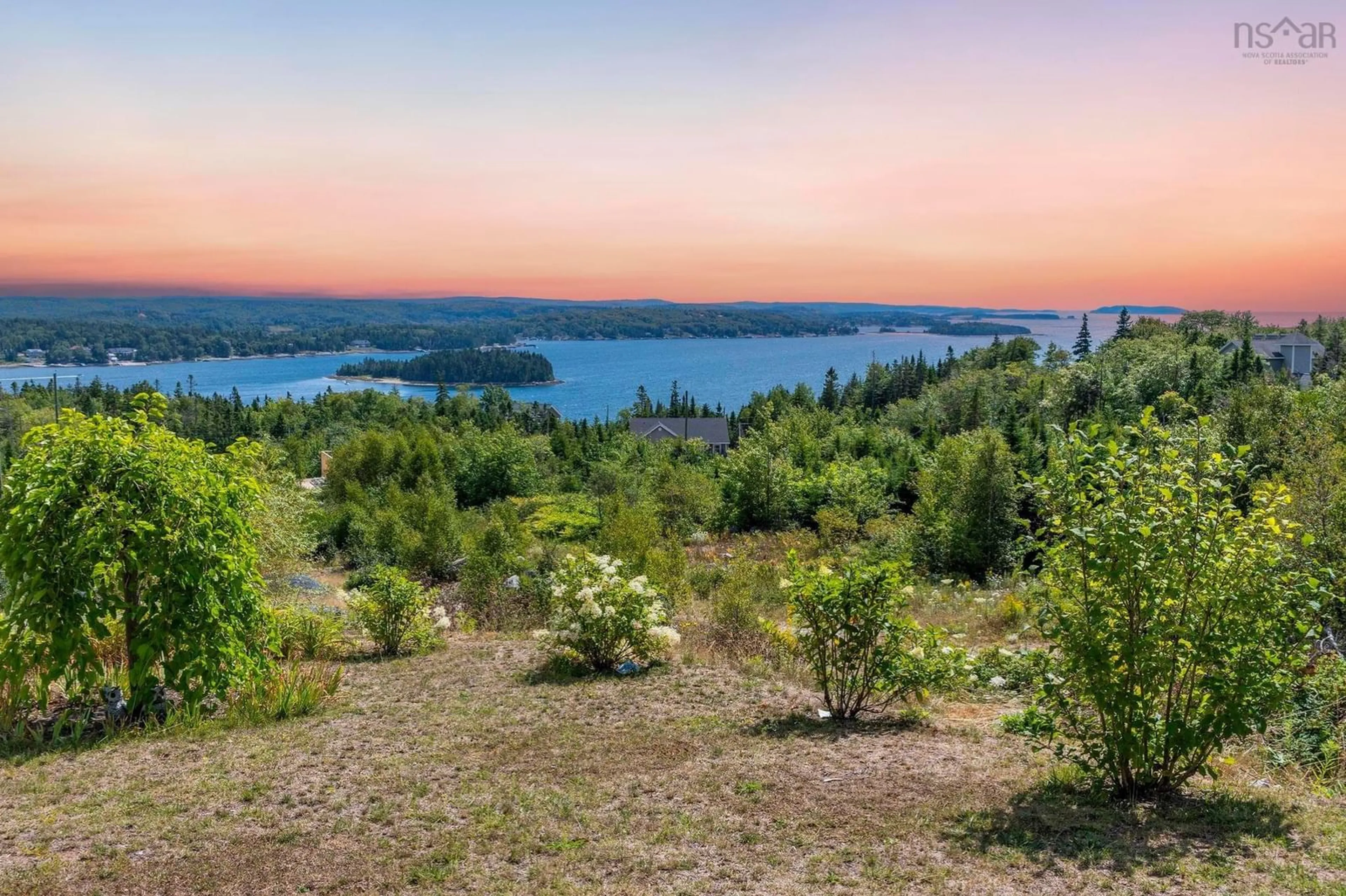 A pic from outside/outdoor area/front of a property/back of a property/a pic from drone, water/lake/river/ocean view for 166 Hillside Dr, Boutiliers Point Nova Scotia B3Z 1W8
