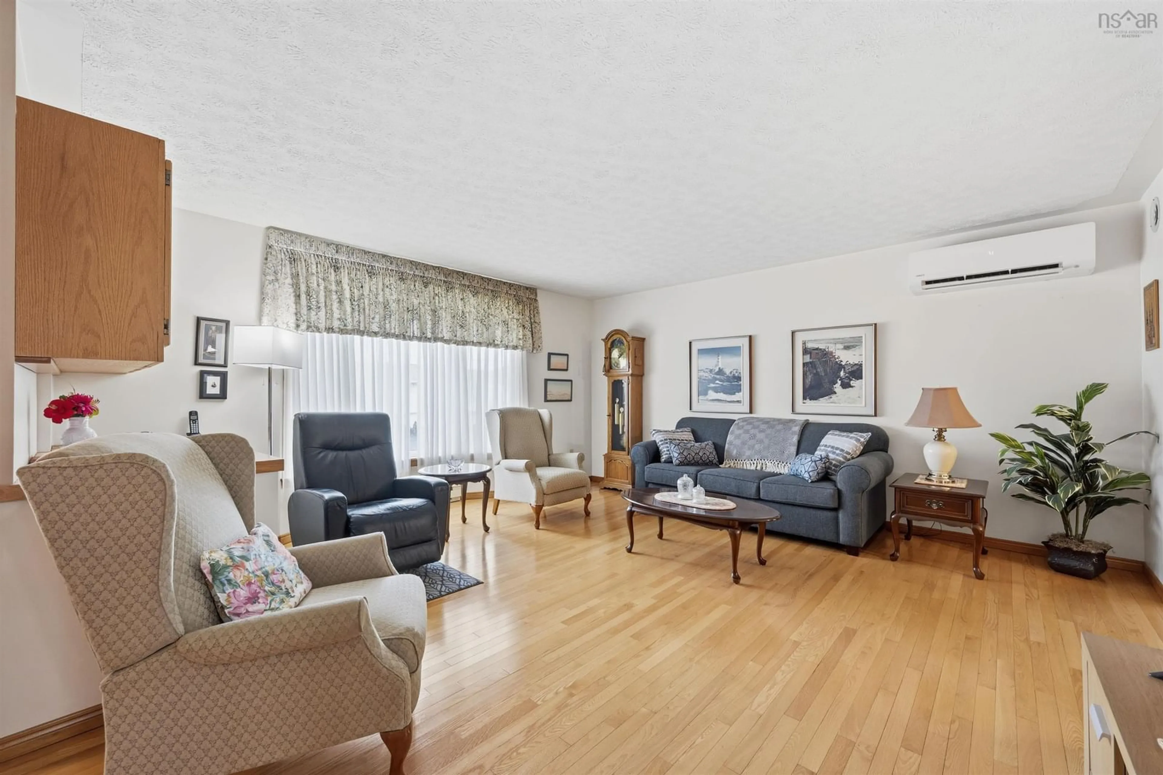 Living room with furniture, wood/laminate floor for 13 Camilla Crt, Dartmouth Nova Scotia B2X 3K4