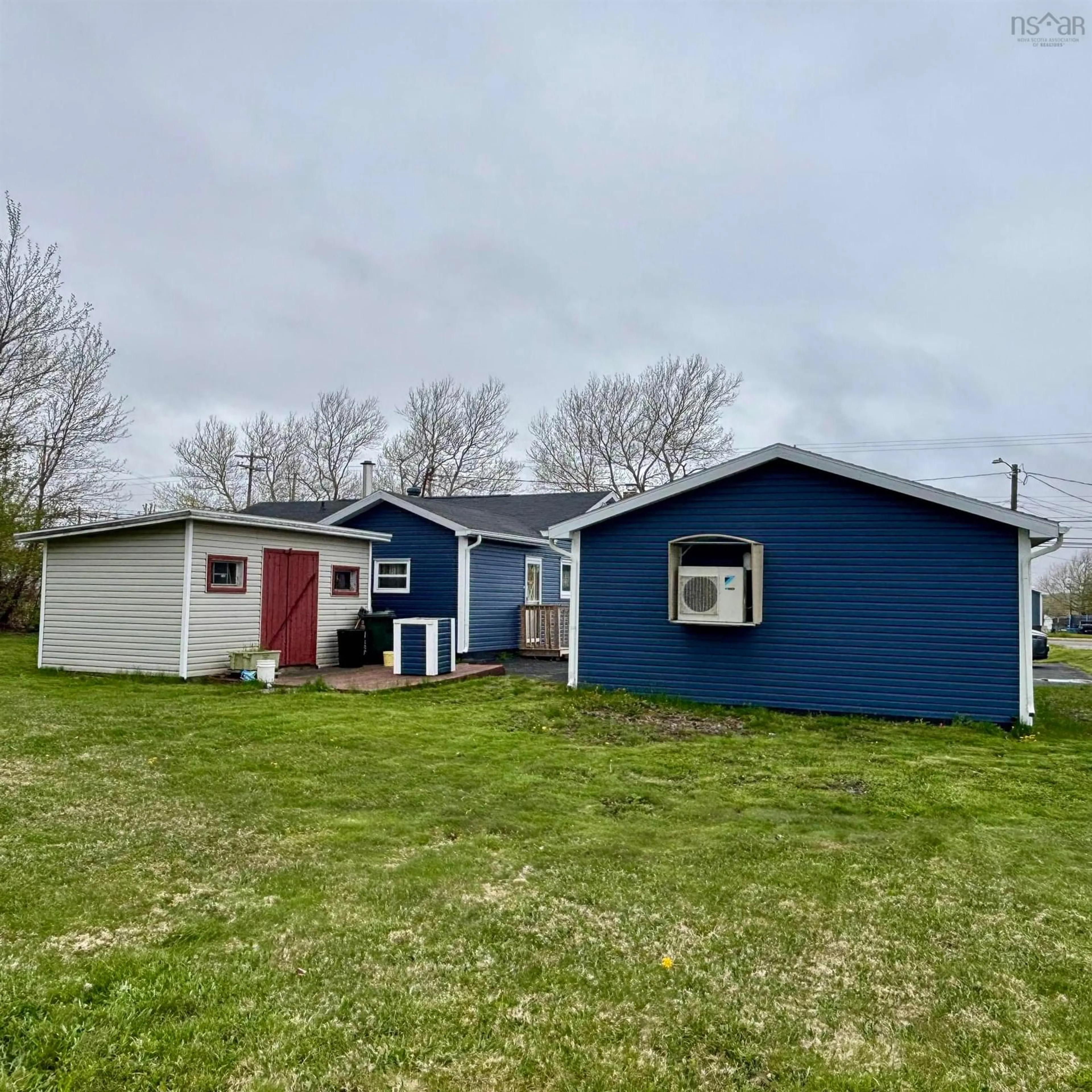 A pic from outside/outdoor area/front of a property/back of a property/a pic from drone, unknown for 654 Mahon St, New Waterford Nova Scotia B1H 3K3