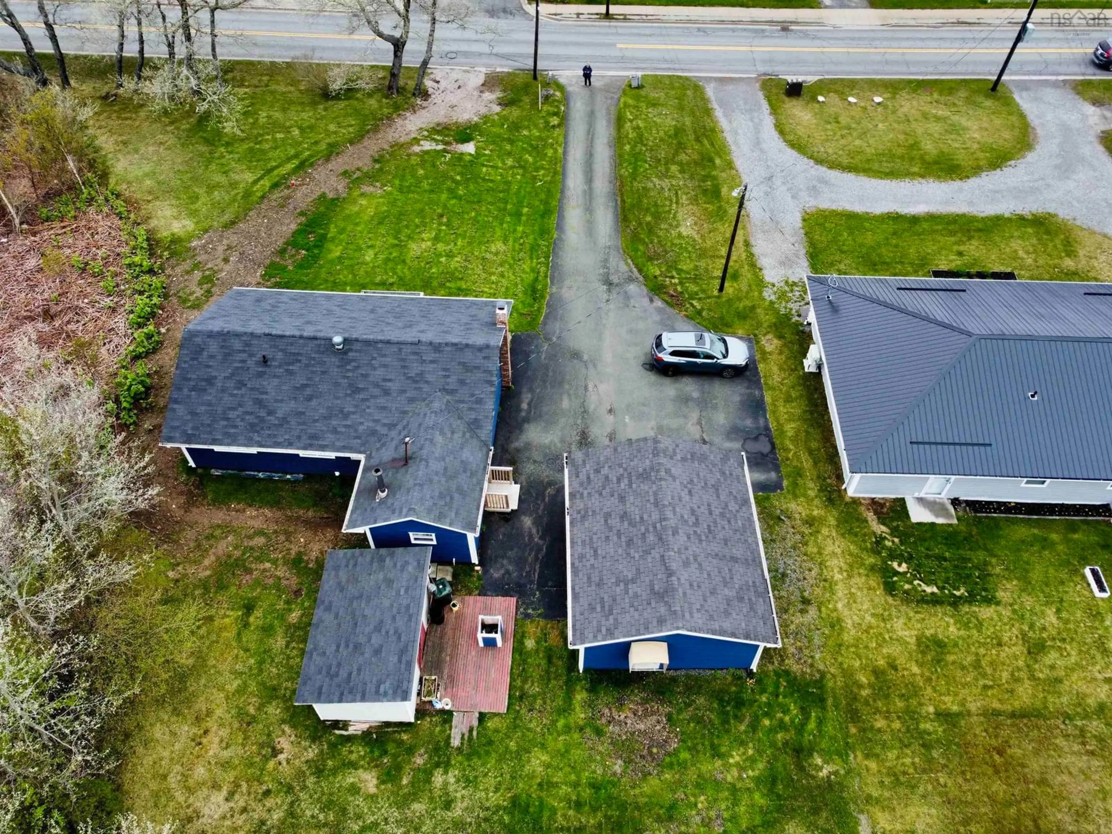 A pic from outside/outdoor area/front of a property/back of a property/a pic from drone, street for 654 Mahon St, New Waterford Nova Scotia B1H 3K3