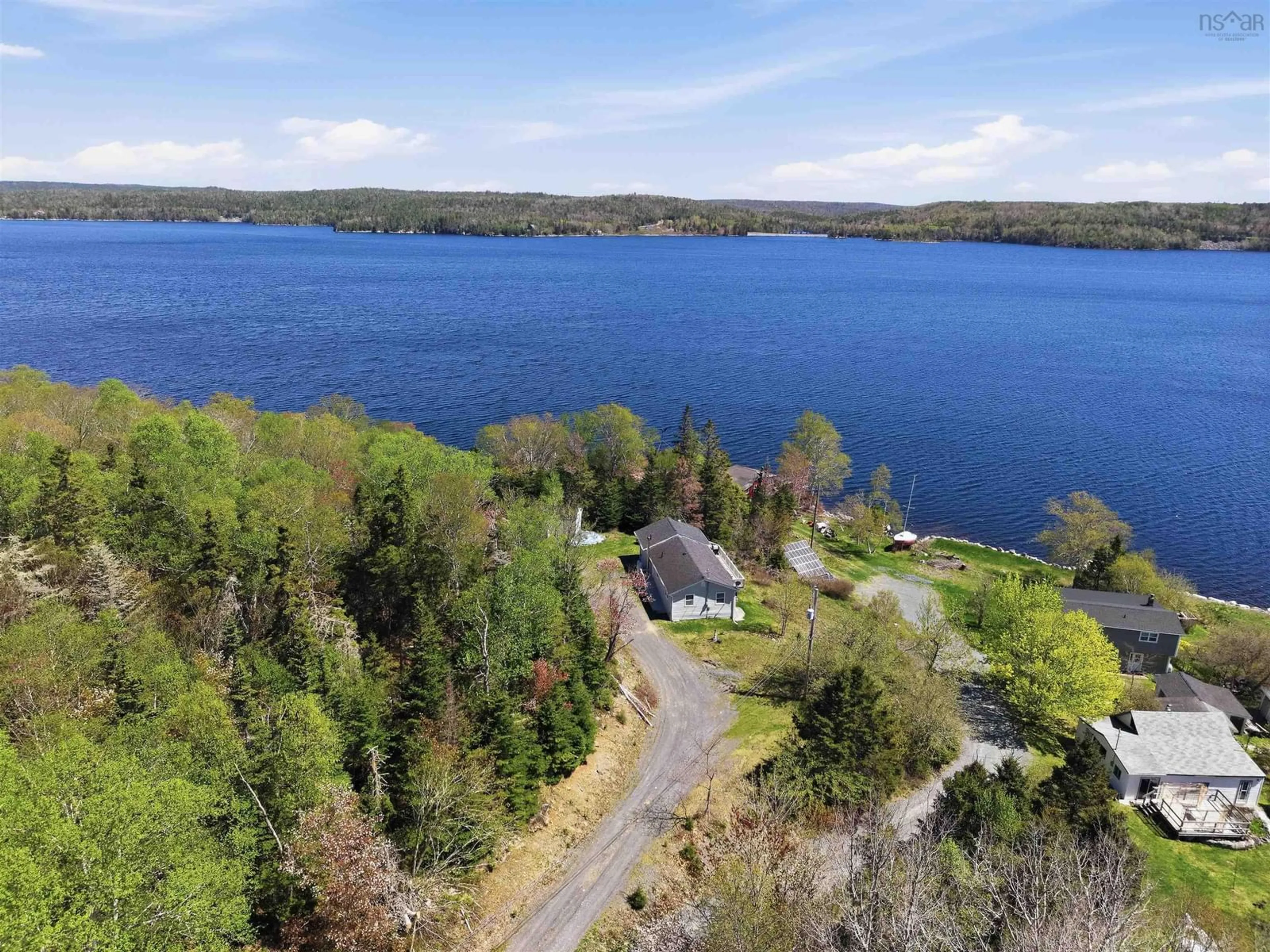 A pic from outside/outdoor area/front of a property/back of a property/a pic from drone, water/lake/river/ocean view for 63 Deanery Rd, Lower Ship Harbour Nova Scotia B0J 2L0