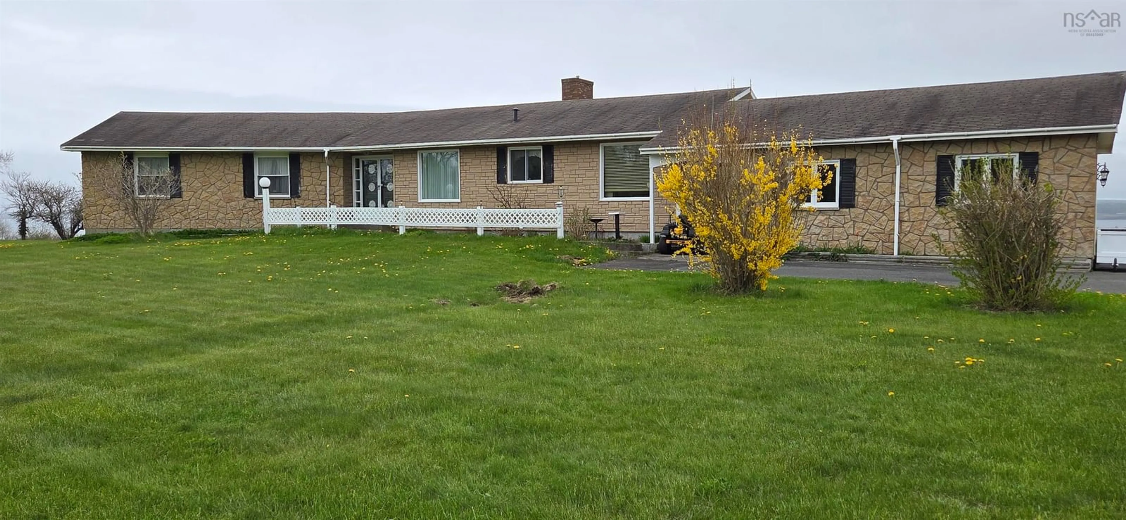 A pic from outside/outdoor area/front of a property/back of a property/a pic from drone, unknown for 837 Shore Rd, Sydney Mines Nova Scotia B1V 1A7