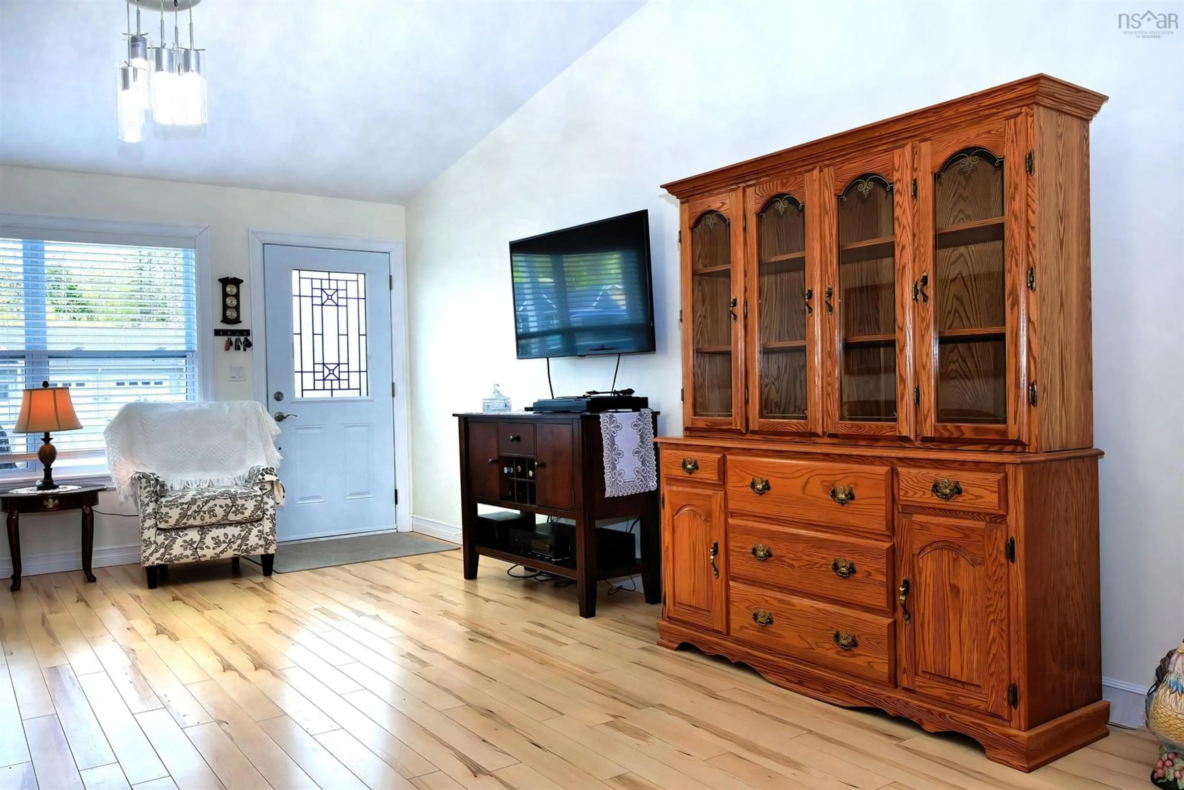 Living room with furniture, wood/laminate floor for 38 Covington Pl, Bible Hill Nova Scotia B2N 0J8