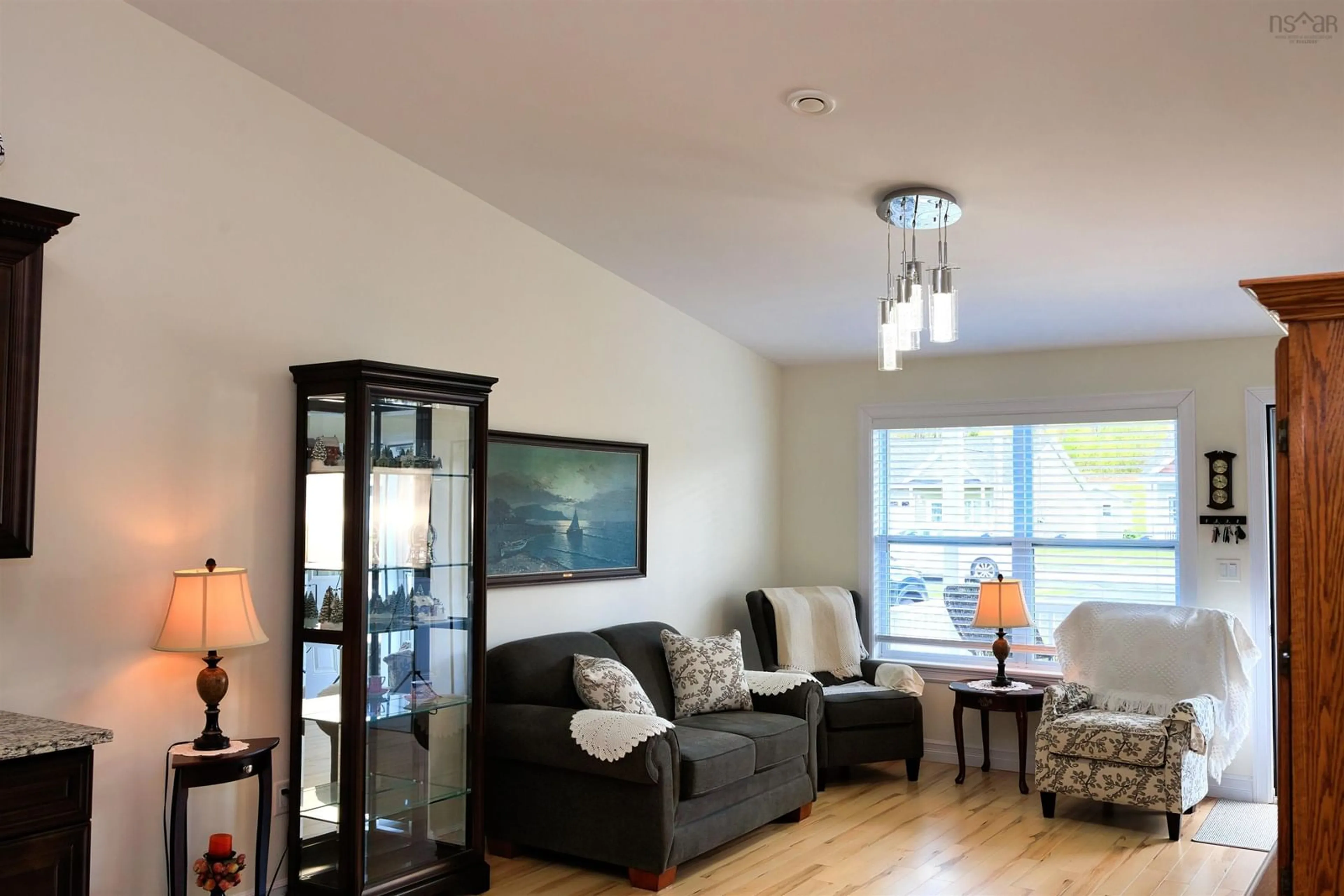 Living room with furniture, wood/laminate floor for 38 Covington Pl, Bible Hill Nova Scotia B2N 0J8