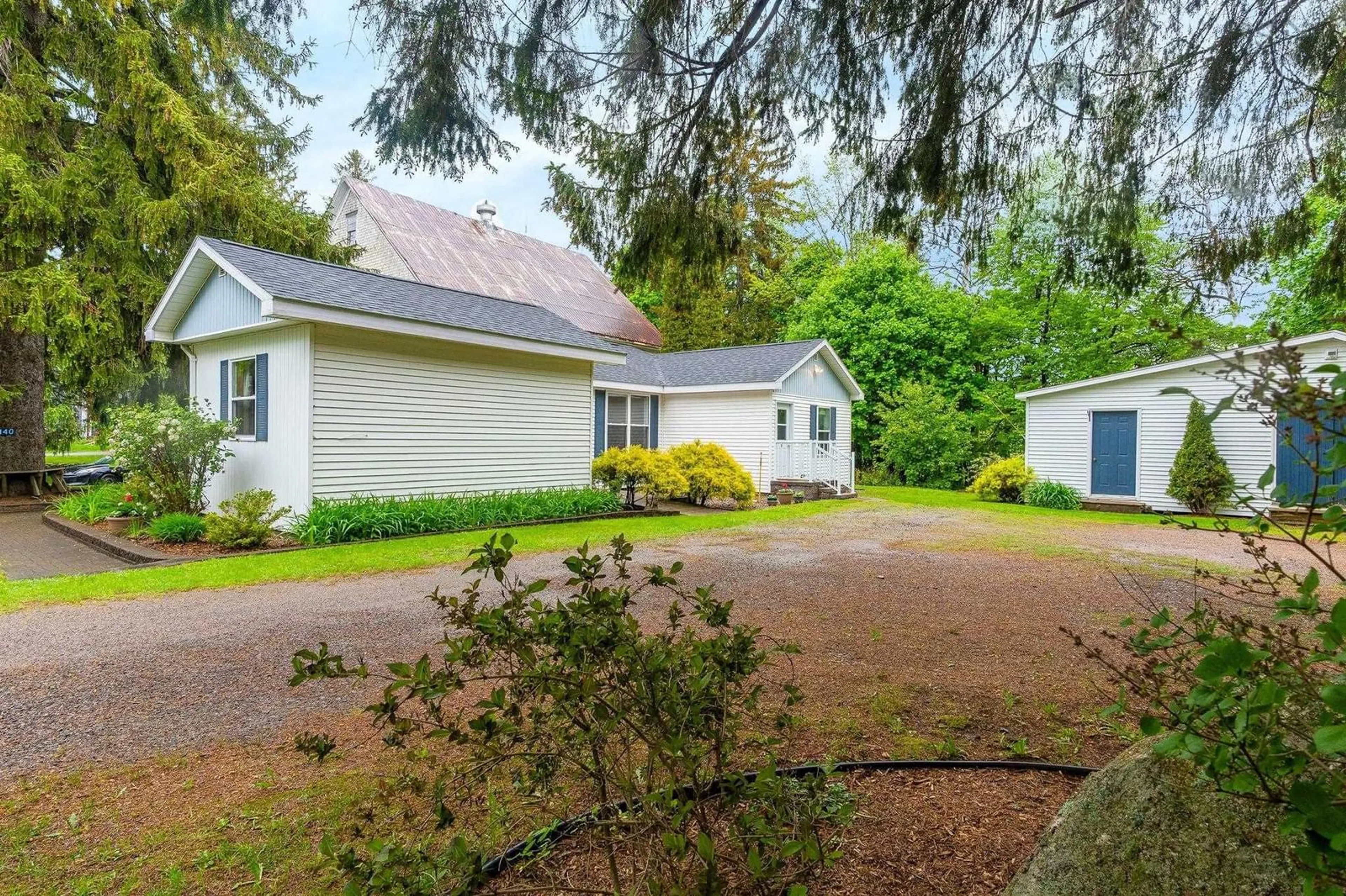 A pic from outside/outdoor area/front of a property/back of a property/a pic from drone, street for 1140 Maple Avenue, Aylesford Nova Scotia B0P 1C0