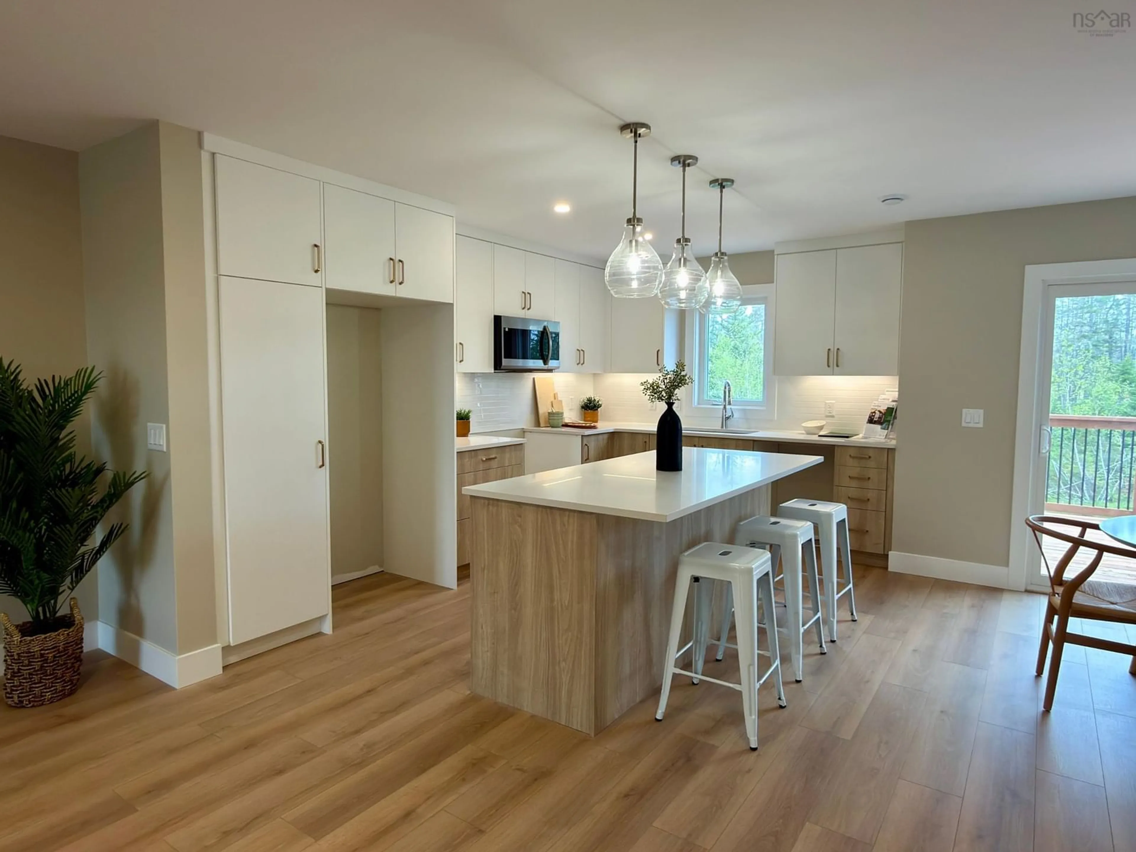 Open concept kitchen, wood/laminate floor for 67 Lew Cres #L043B, Lantz Nova Scotia B2S 0H9