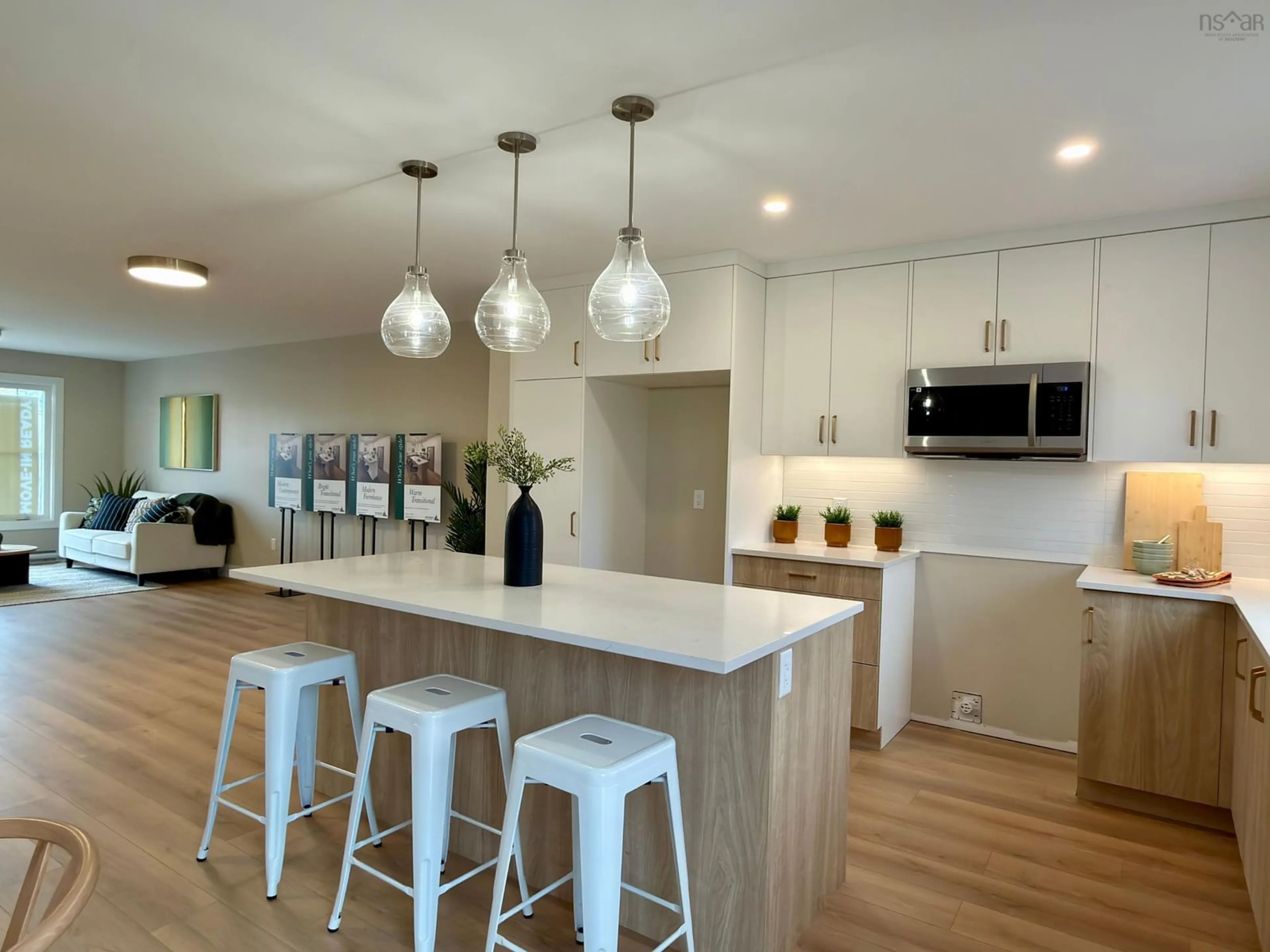 Open concept kitchen, wood/laminate floor for 67 Lew Cres #L043B, Lantz Nova Scotia B2S 0H9
