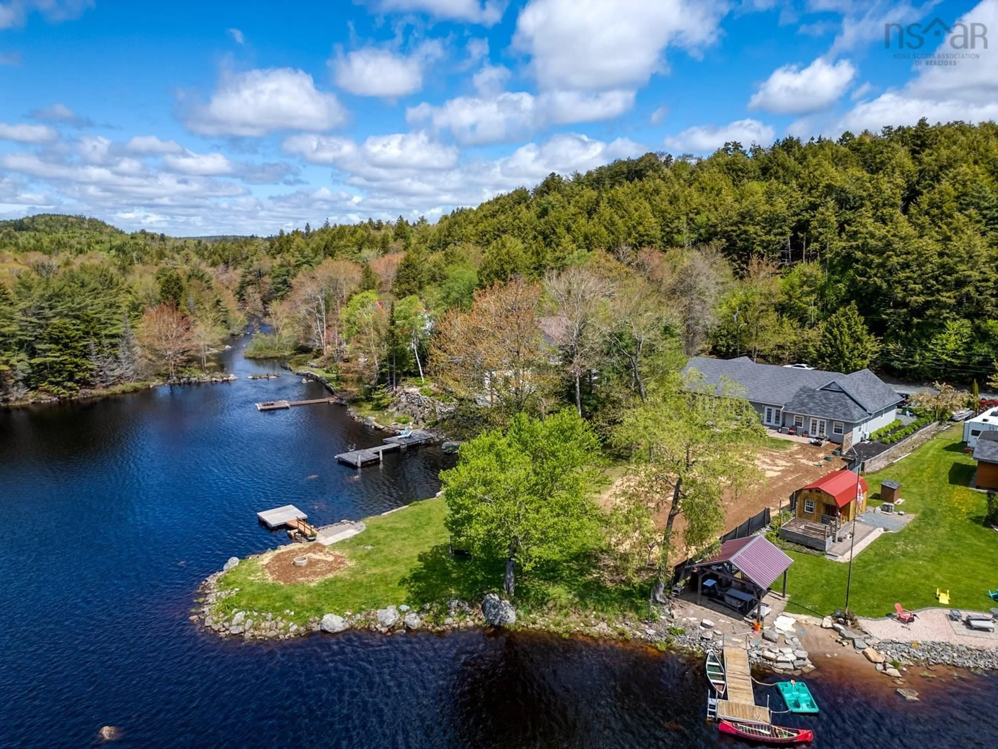 A pic from outside/outdoor area/front of a property/back of a property/a pic from drone, water/lake/river/ocean view for 111 River Dr, Lake Echo Nova Scotia B3E 1C8