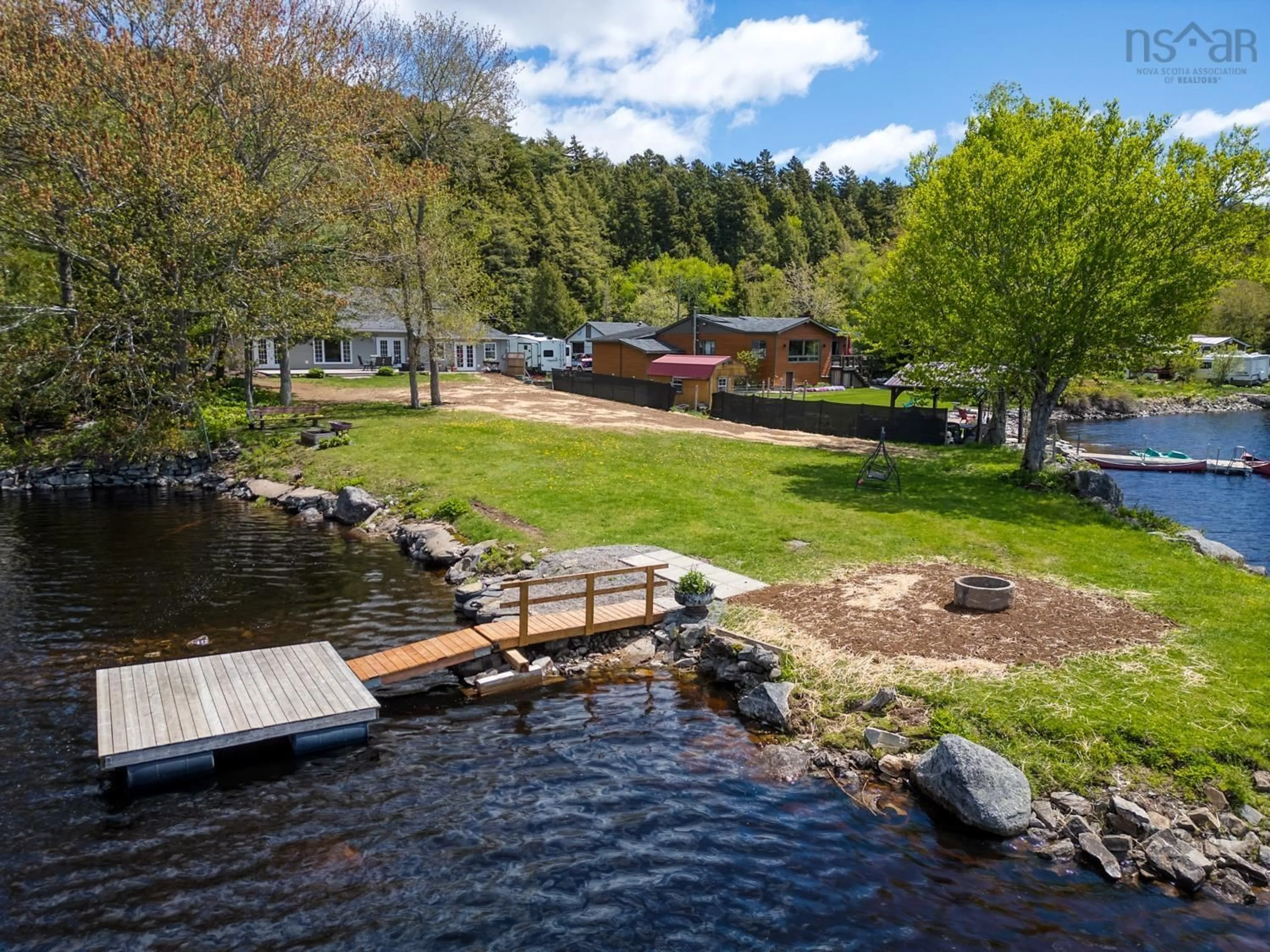 A pic from outside/outdoor area/front of a property/back of a property/a pic from drone, water/lake/river/ocean view for 111 River Dr, Lake Echo Nova Scotia B3E 1C8