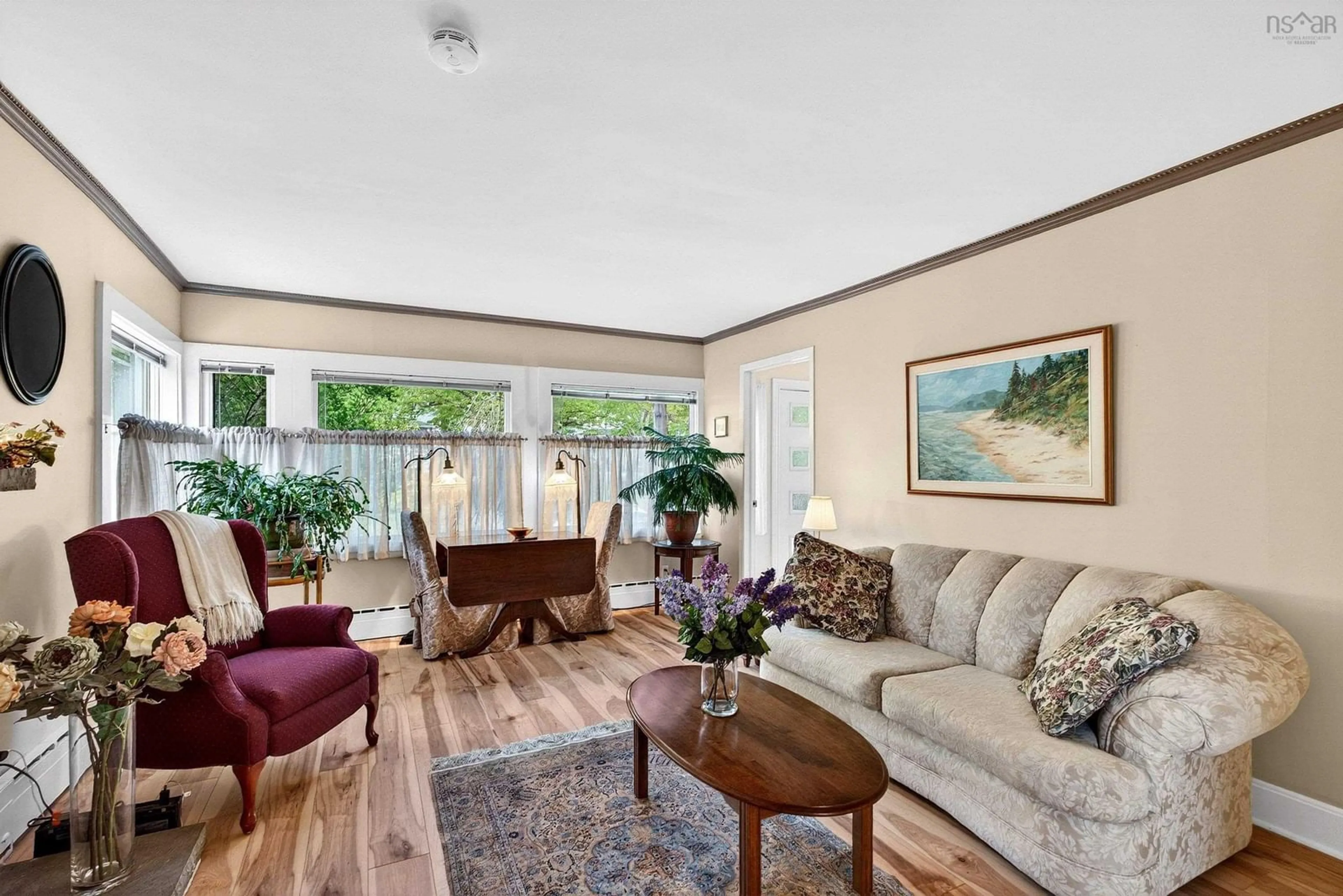 Living room with furniture, wood/laminate floor for 2434 Connaught Avenue, Halifax Nova Scotia B3L 2Z4