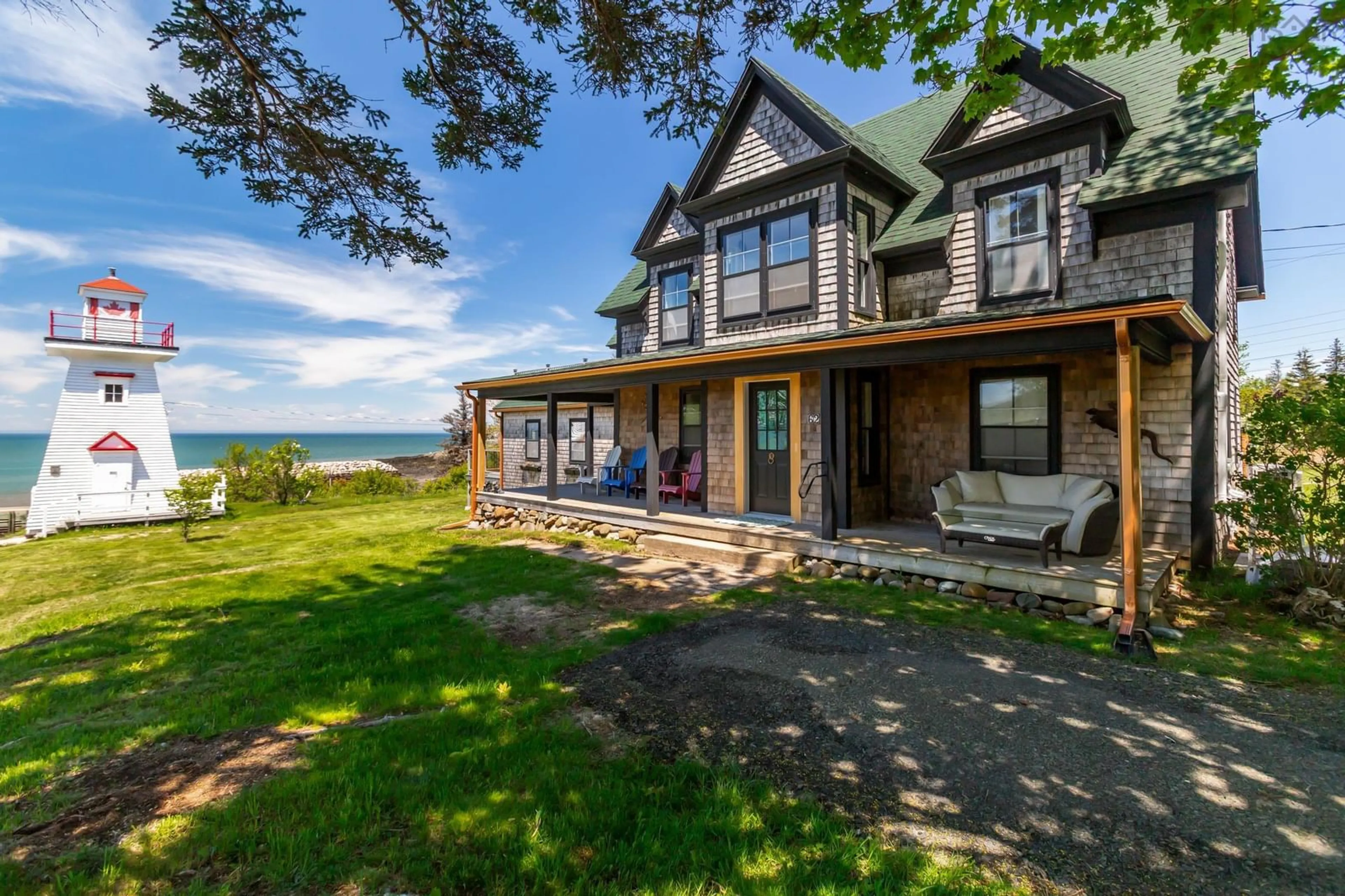 A pic from outside/outdoor area/front of a property/back of a property/a pic from drone, water/lake/river/ocean view for 62 Hampton Wharf Rd, Hampton Nova Scotia B0S 1L0