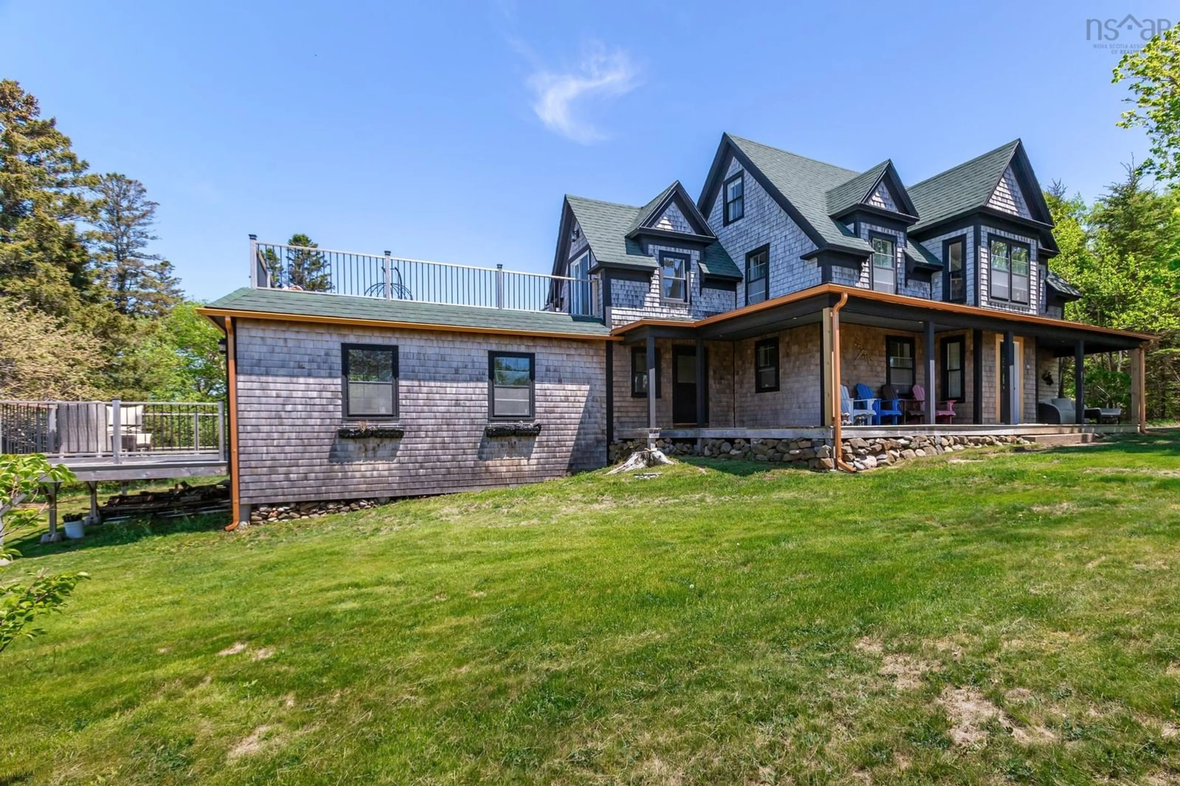 A pic from outside/outdoor area/front of a property/back of a property/a pic from drone, building for 62 Hampton Wharf Rd, Hampton Nova Scotia B0S 1L0