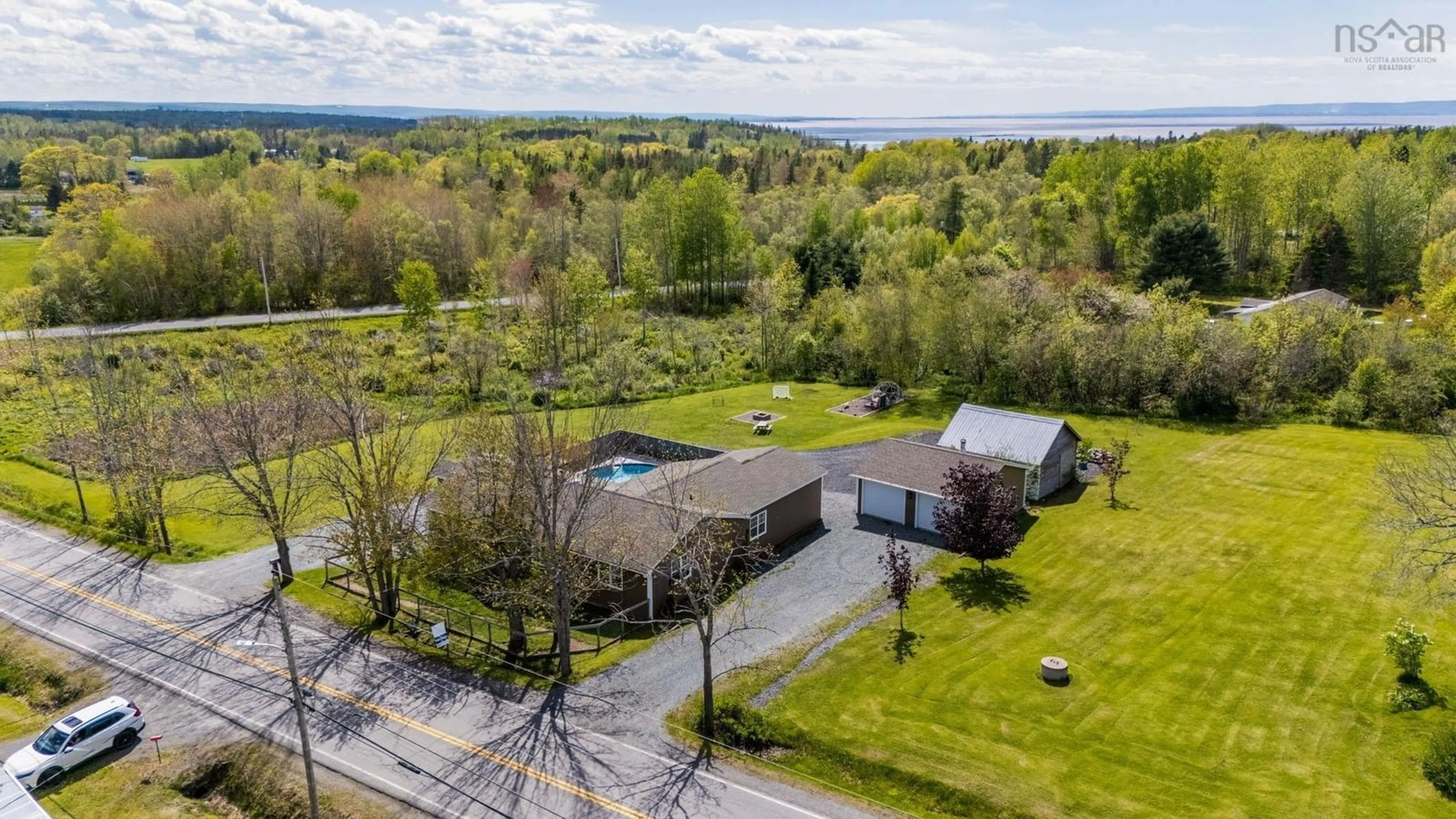 A pic from outside/outdoor area/front of a property/back of a property/a pic from drone, water/lake/river/ocean view for 6981 Highway 215, Bramber Nova Scotia B0N 2R0