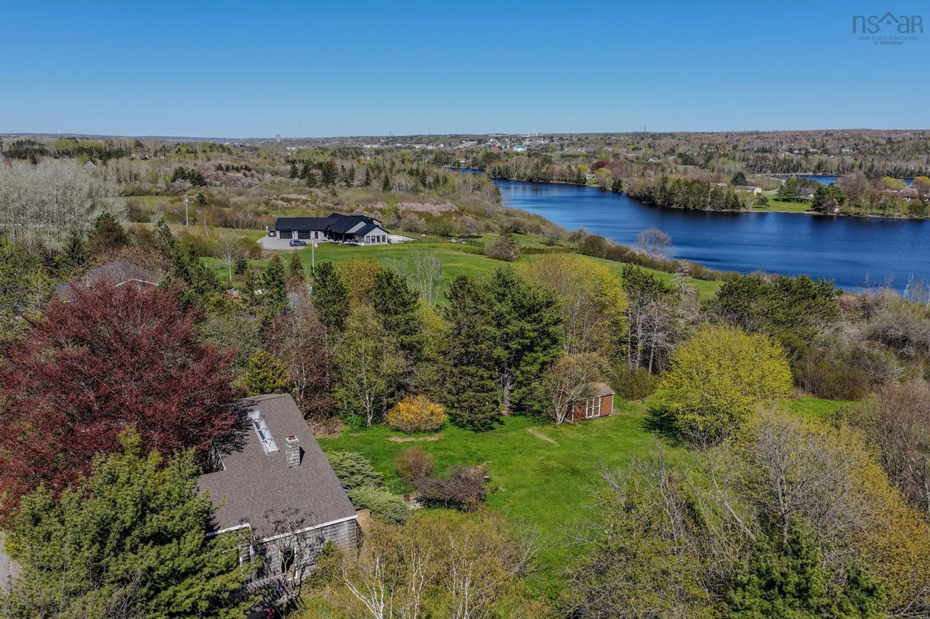 A pic from outside/outdoor area/front of a property/back of a property/a pic from drone, water/lake/river/ocean view for 765 Coxheath Rd, Coxheath Nova Scotia B1L 1B5