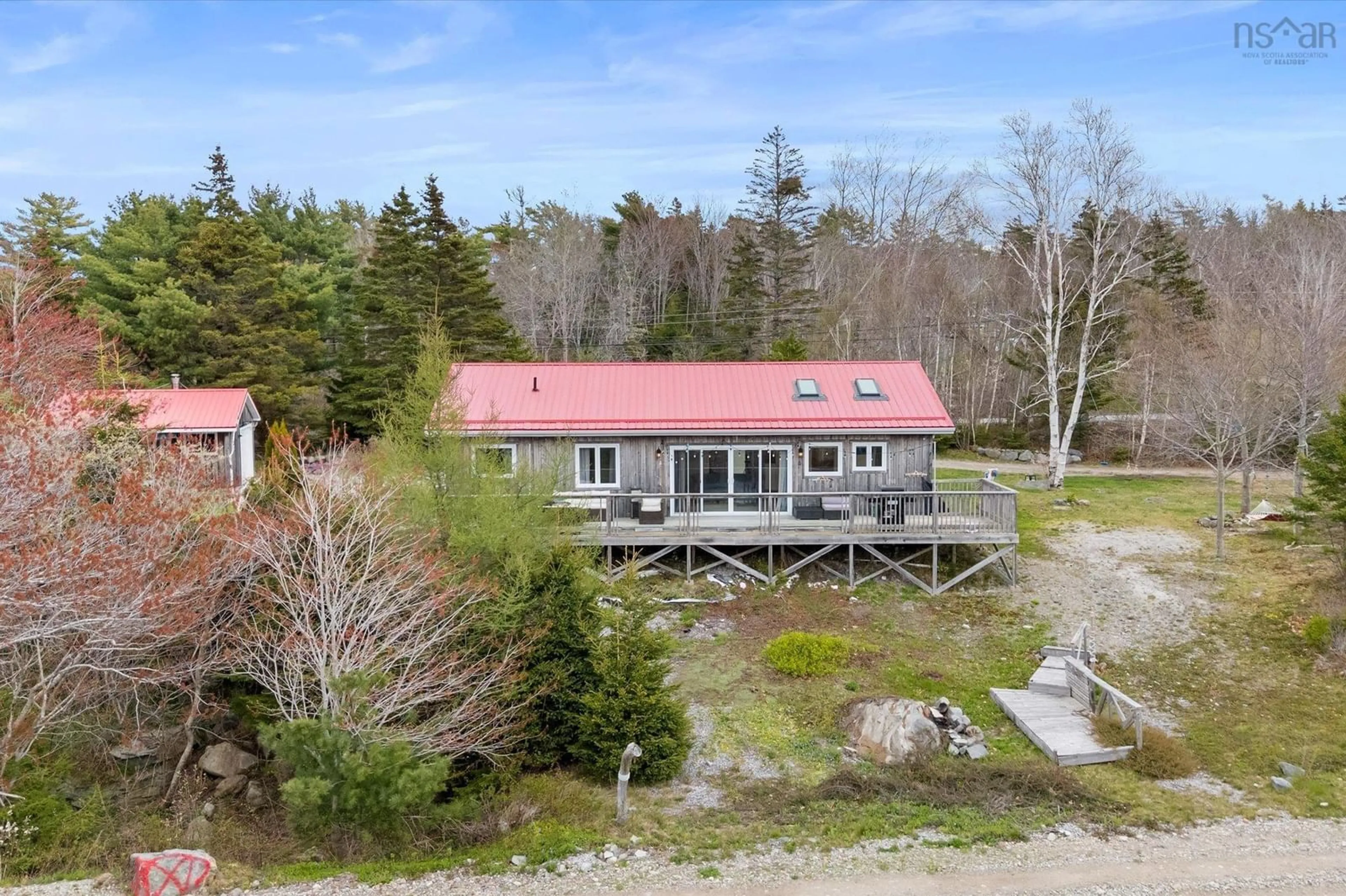 A pic from outside/outdoor area/front of a property/back of a property/a pic from drone, water/lake/river/ocean view for 5853 3 Hwy, East Jordan Nova Scotia B0T 1J0