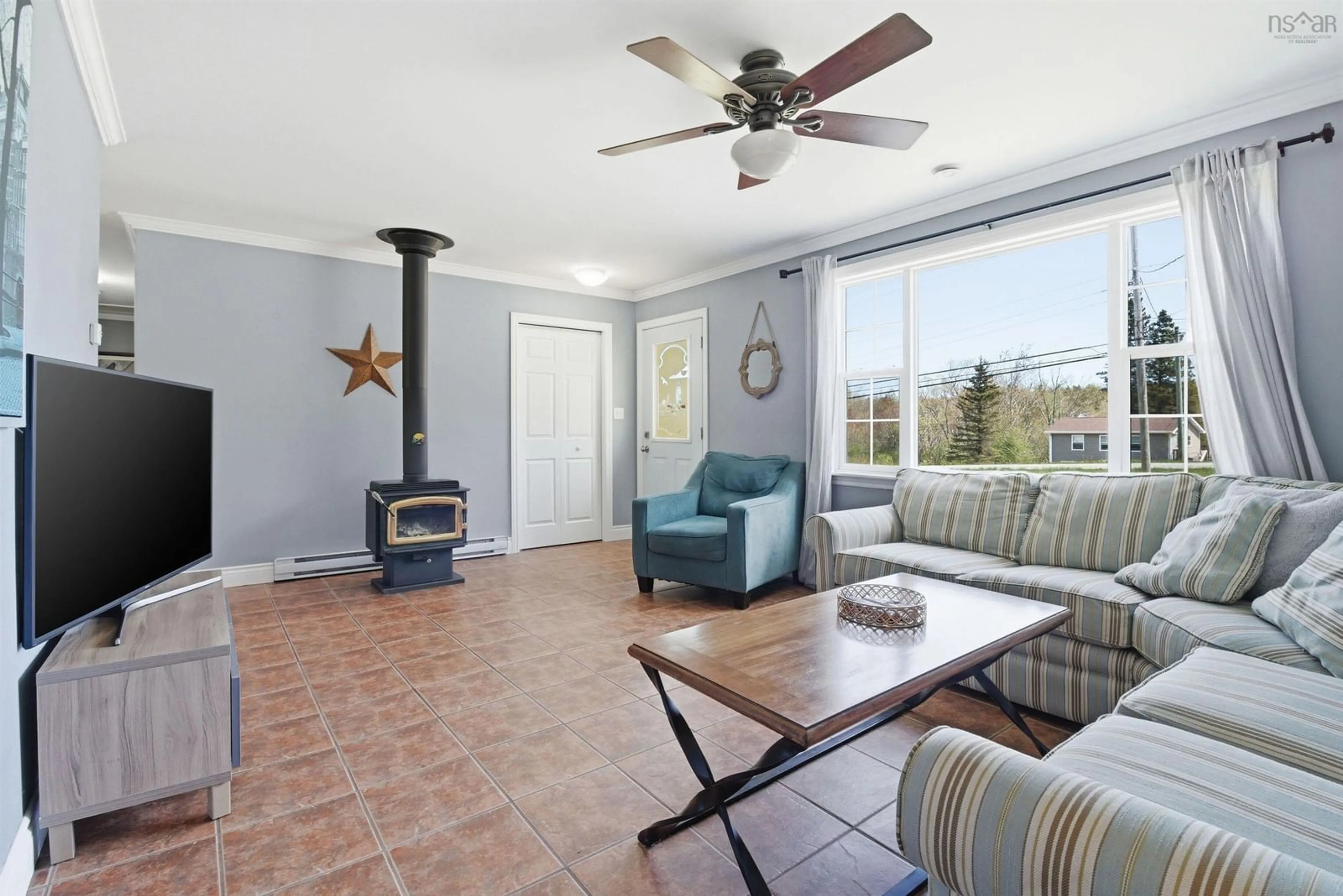 Living room with furniture, ceramic/tile floor for 3725 Highway 215, Centre Burlington Nova Scotia B0N 2A0