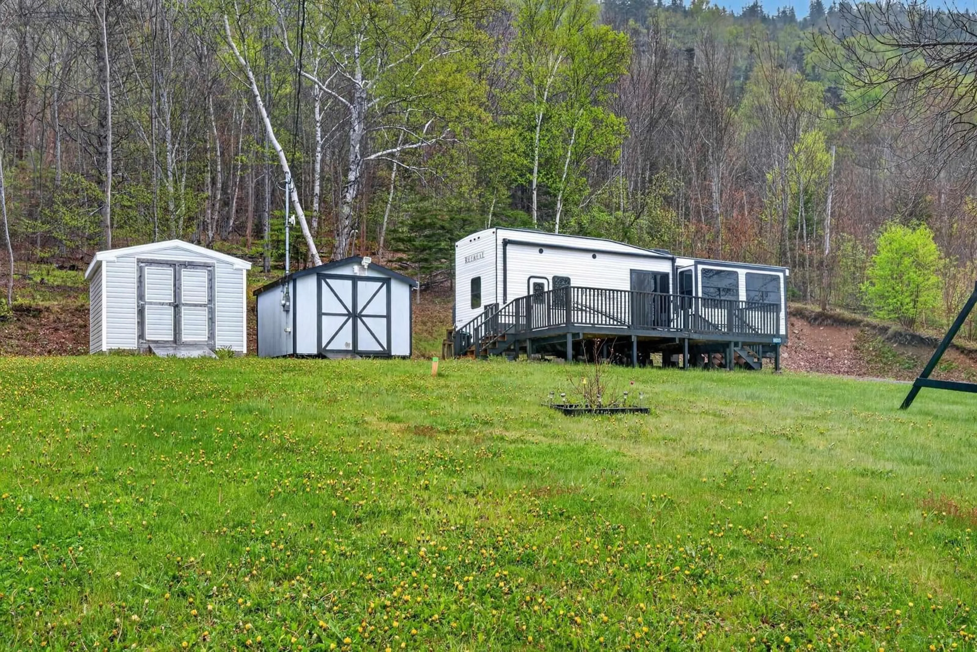 A pic from outside/outdoor area/front of a property/back of a property/a pic from drone, unknown for 9605 East Bay Hwy, Irishvale Nova Scotia B1J 2B3